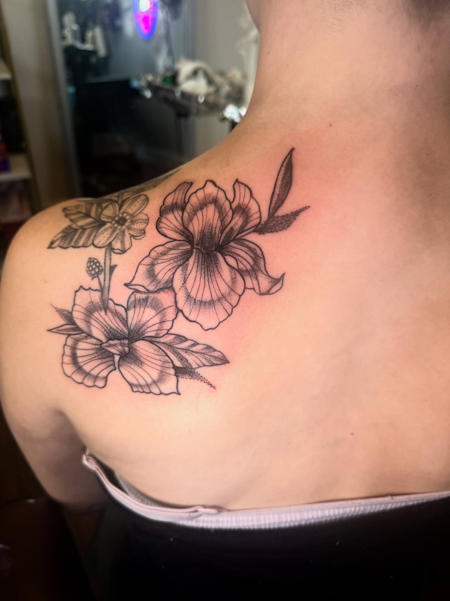 Flowers black and grey tattoo on the shoulder by Pikashi 🎨🖌️🖤