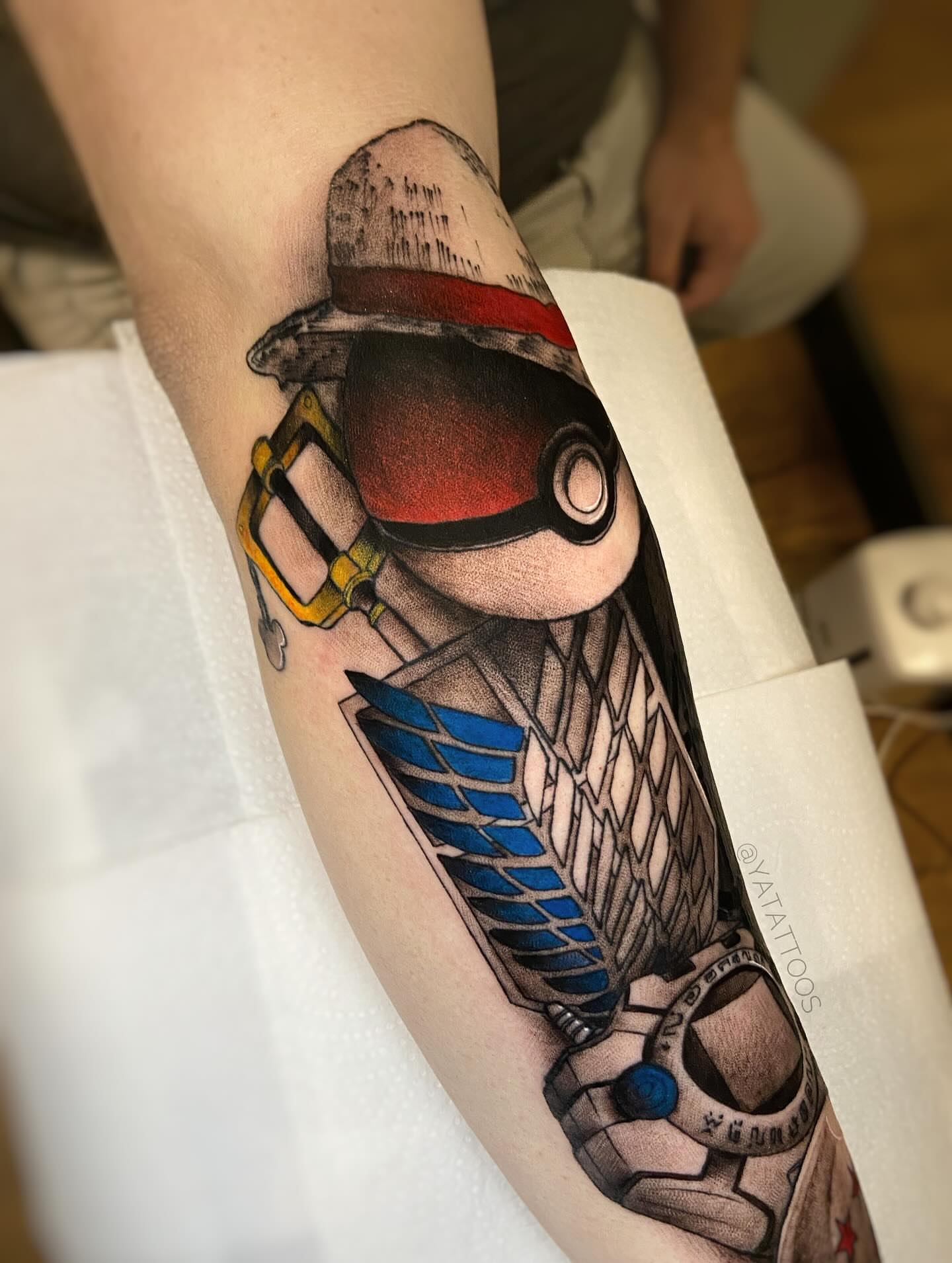 Pokémon trainer realism tattoo on the forearm by Yasmin Almeida