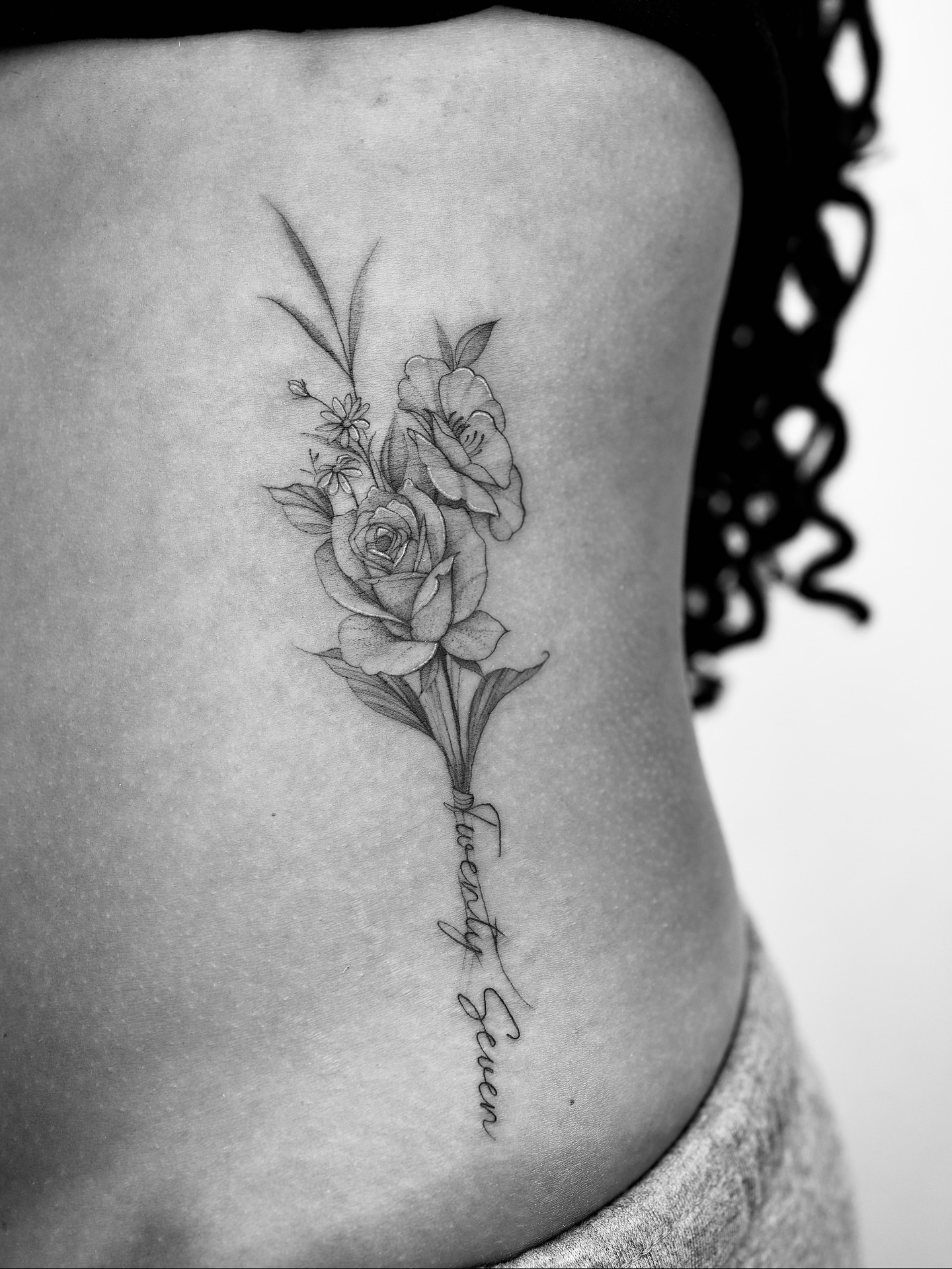 Flower bouquet realism tattoo on the ribs by X