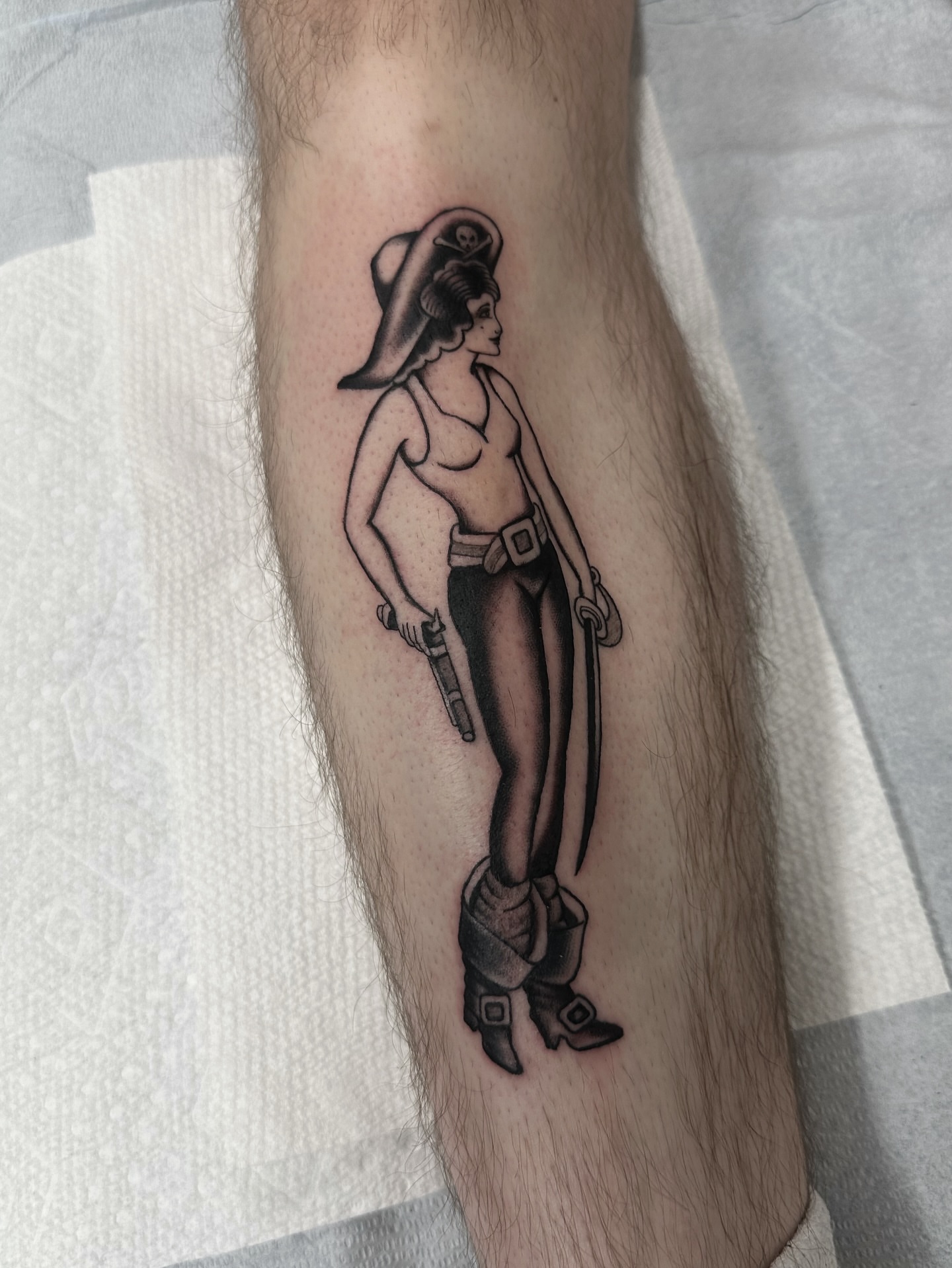 Cowgirl black and grey tattoo on the forearm by Nicholas Lee, San Francisco, California