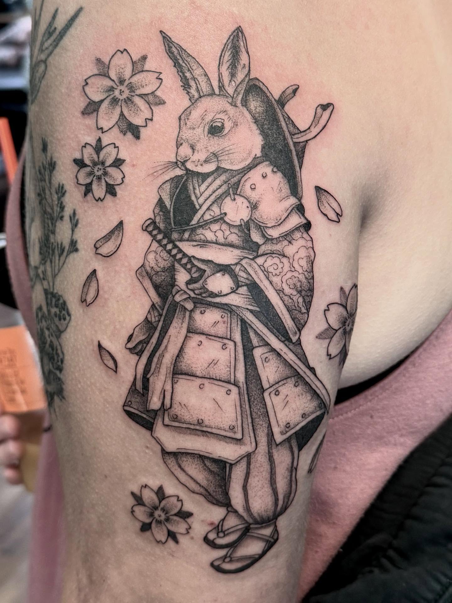 Rabbit samurai realism tattoo on the forearm by Katie Stacy