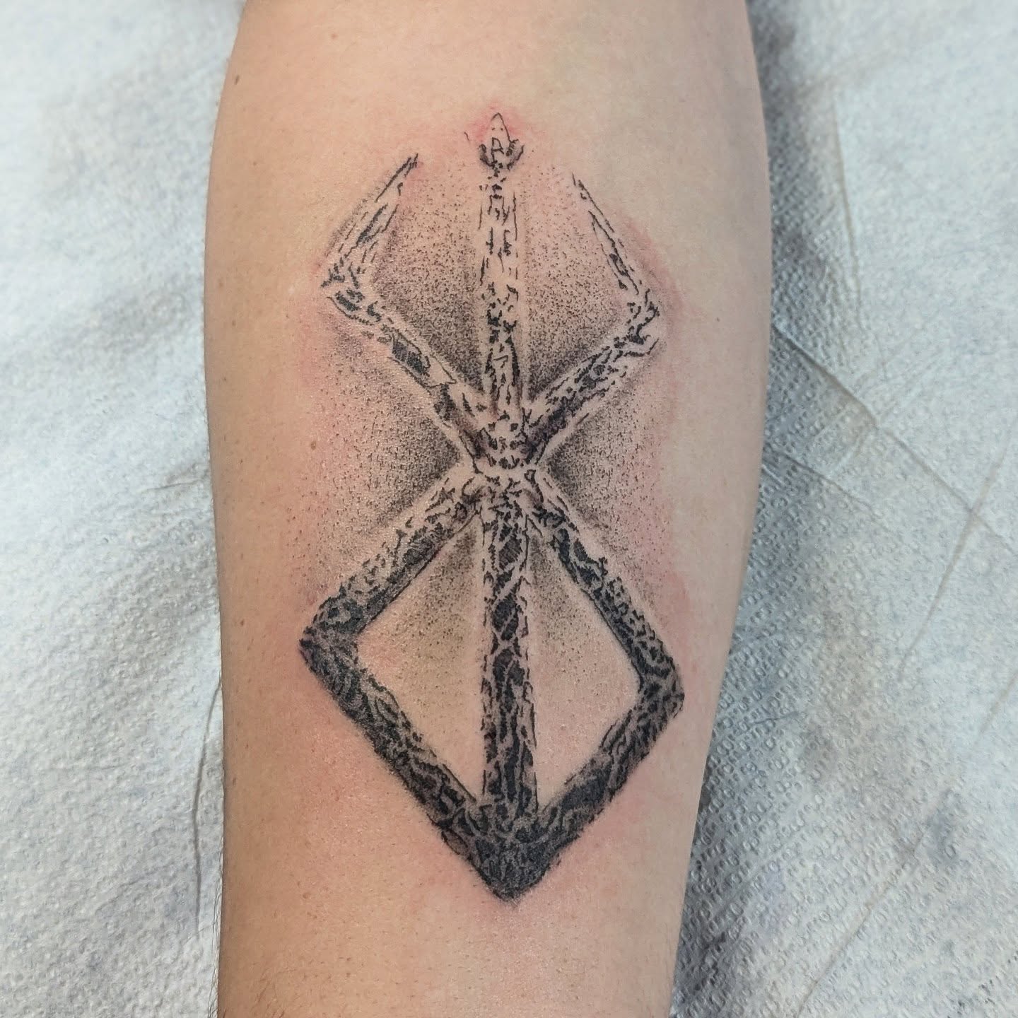 Geometric symbol dotwork tattoo on the forearm by DONEL 📍Denver