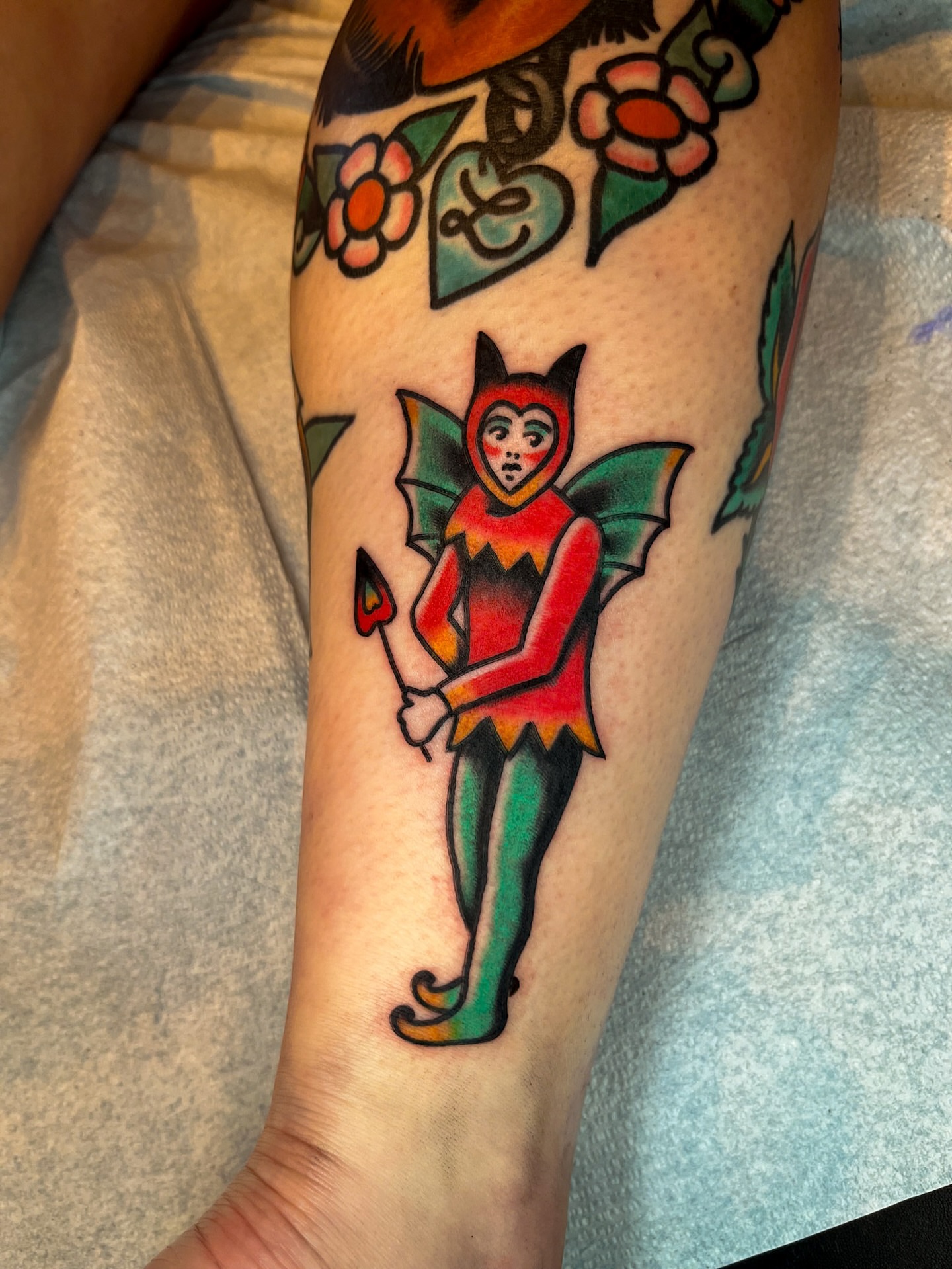 Fairy American traditional tattoo on the forearm by Kehrmie Tattoos, Berkeley, California