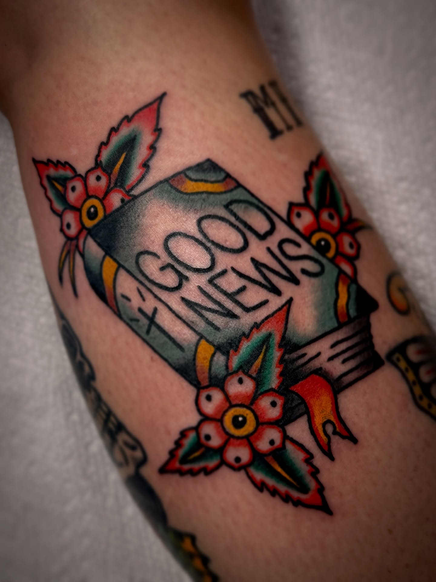 Good news American traditional tattoo on the forearm by Drew McElveney, Austin, Texas