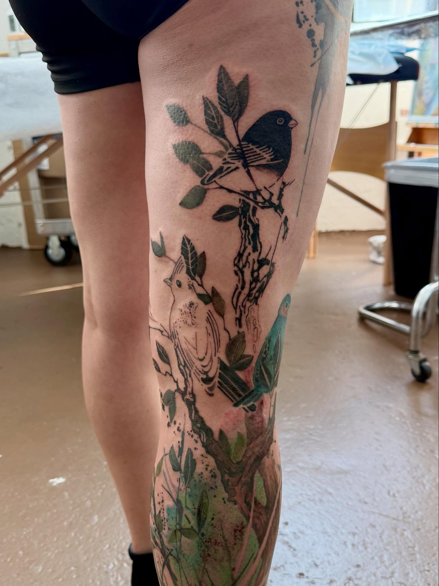 Birds and branches realism tattoo on the leg by Gene Coffey, New York, New York