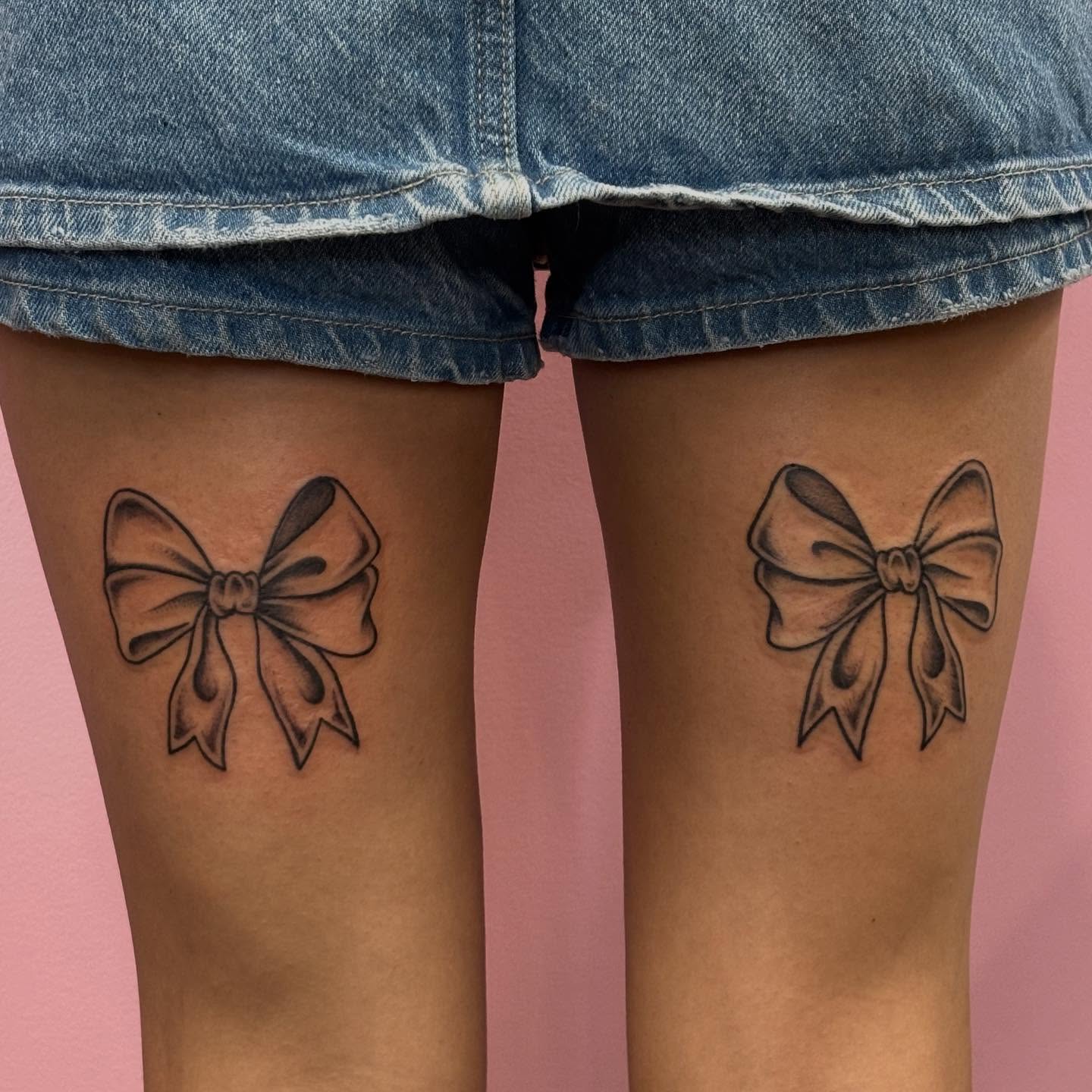 Bow black and grey tattoo on the thigh by Brandi ⛓, Detroit, Michigan