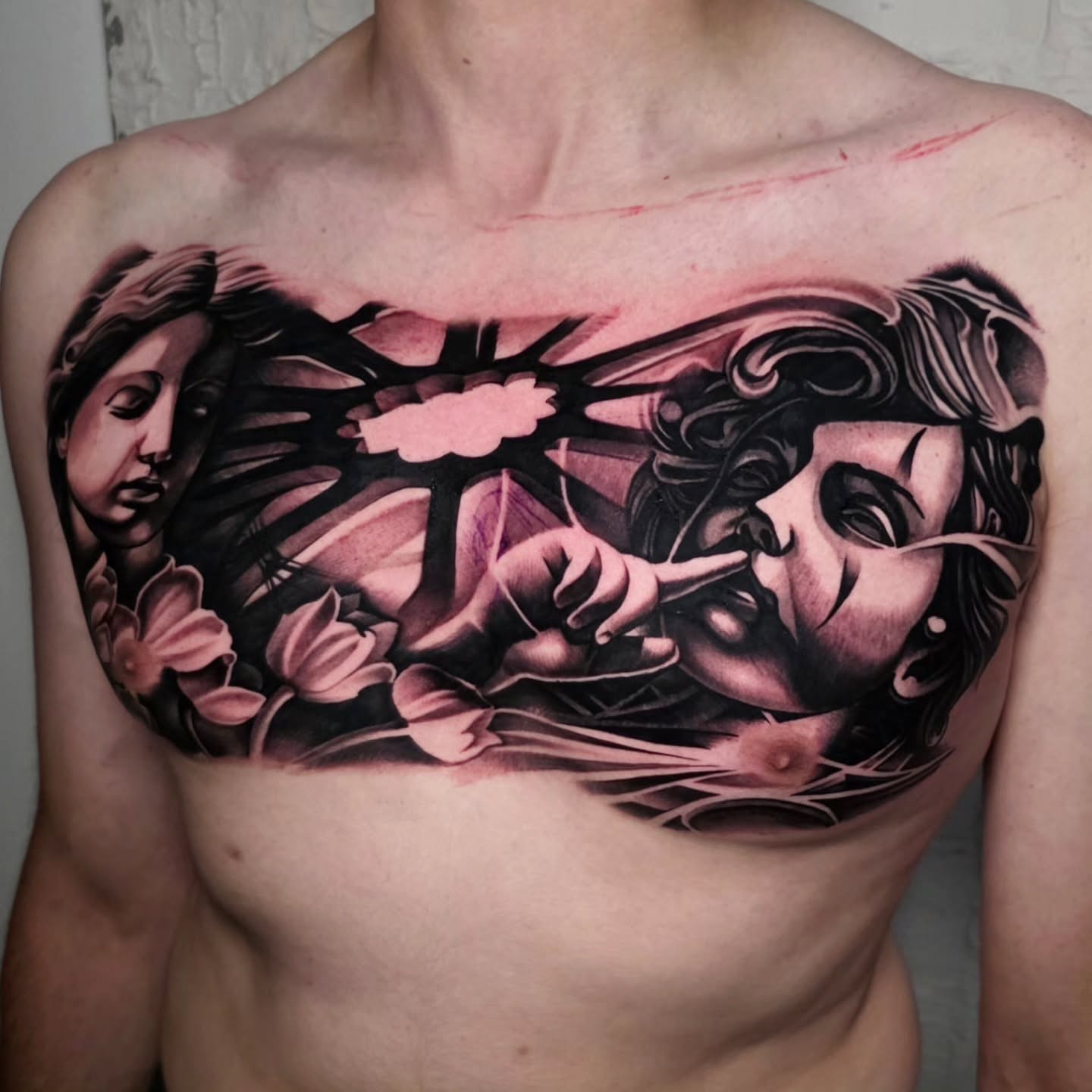Woman with flowers realism tattoo on the chest by Lukasz Olszanski