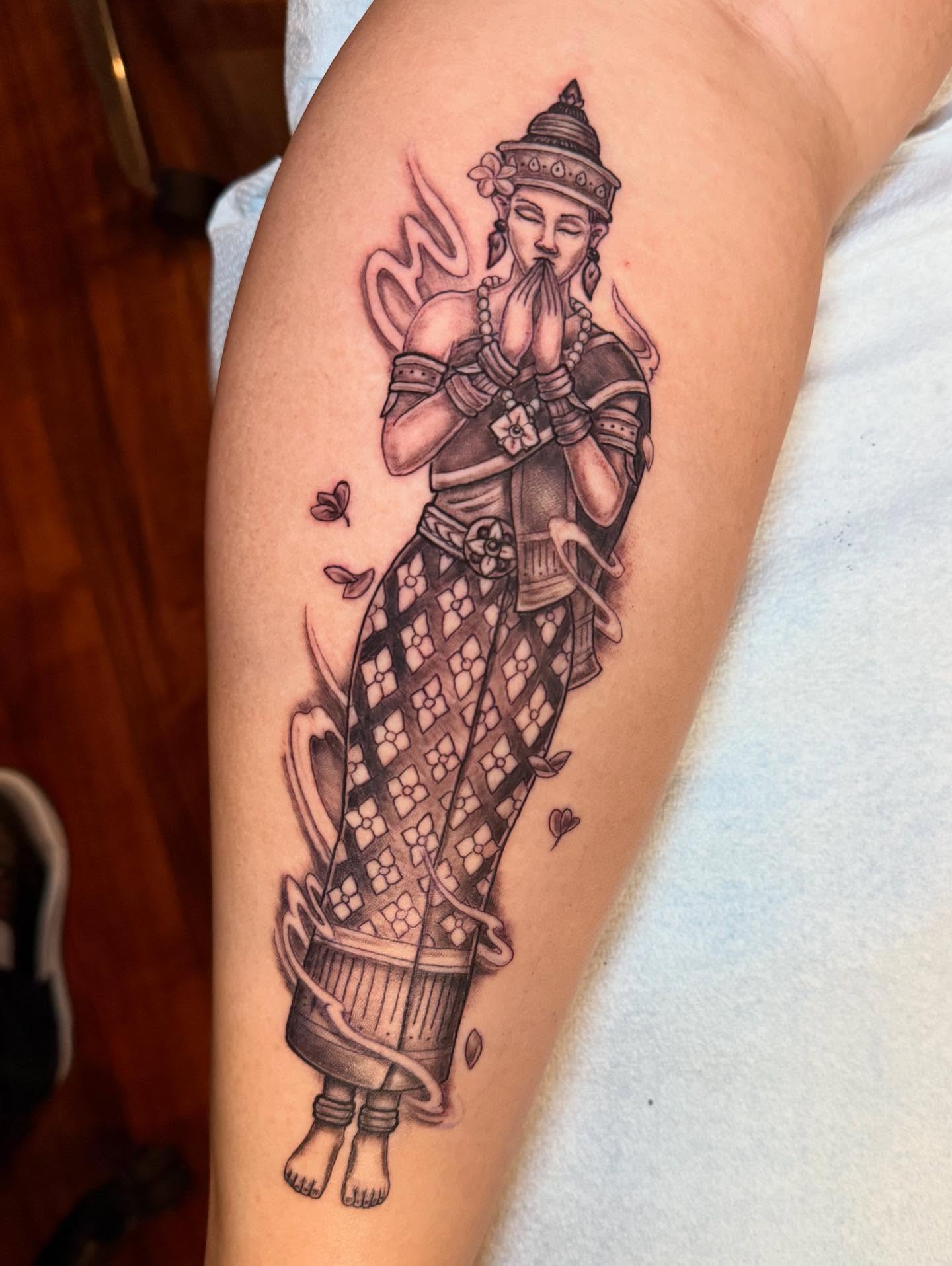 Tattoo by @mekong_lotus — black_and_grey