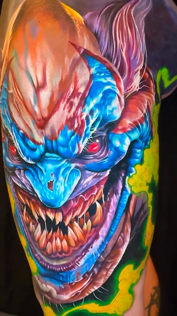 Evil clown face realism tattoo by Noelin Wheeler