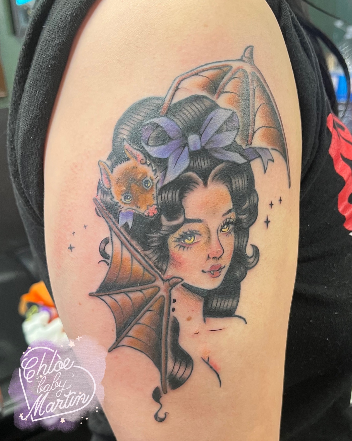 Bat-winged woman American traditional tattoo on the shoulder by Chloe ‘baby’ Martin