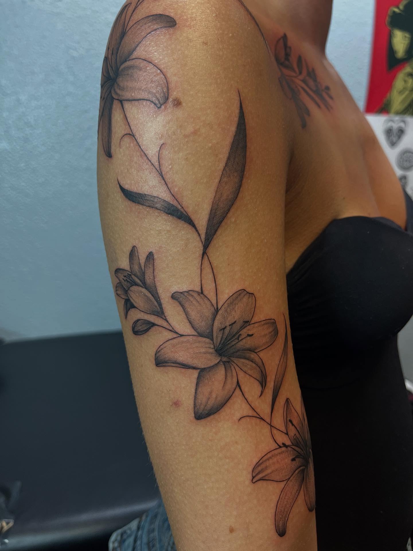 Lilies black and grey tattoo on the forearm by Ana Valadez π¦, Ventura, California