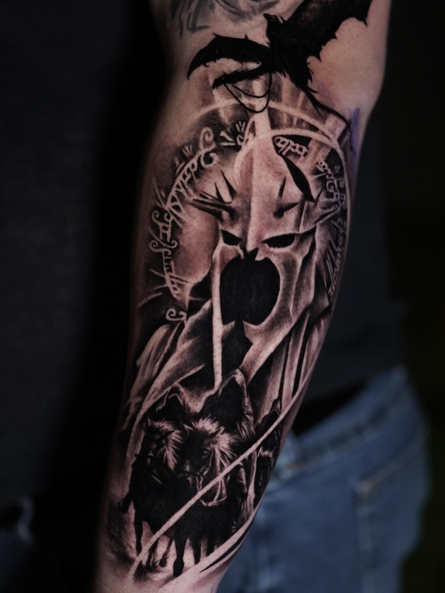 Helmeted warrior realism tattoo on the forearm by Erick Satchell II