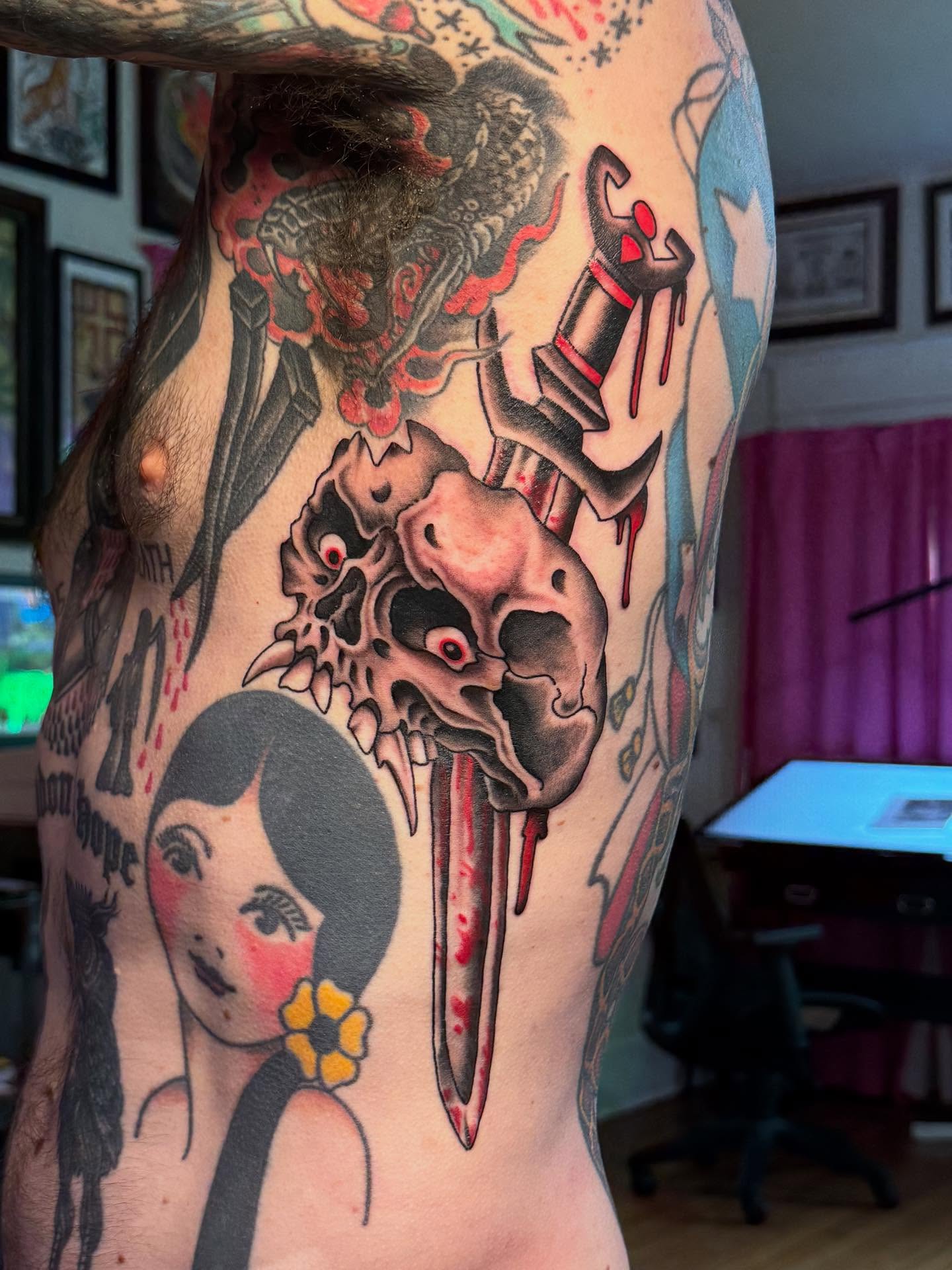 Skull and heart American traditional tattoo on the torso by Hannah Edwards, Austin, Texas