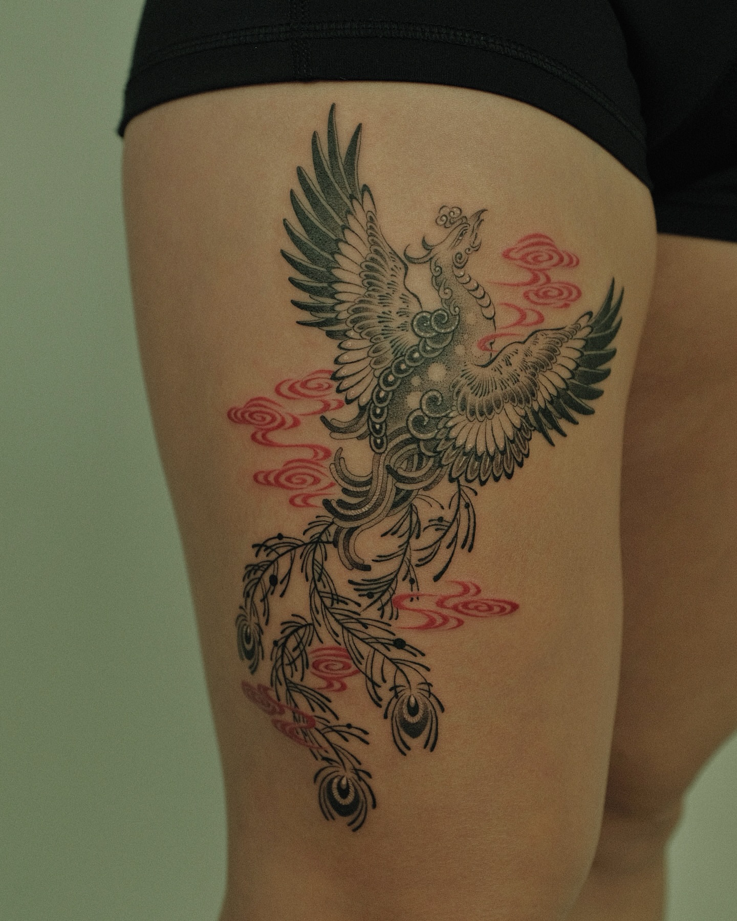 Phoenix japanese irezumi tattoo on the thigh by Xiao Lun