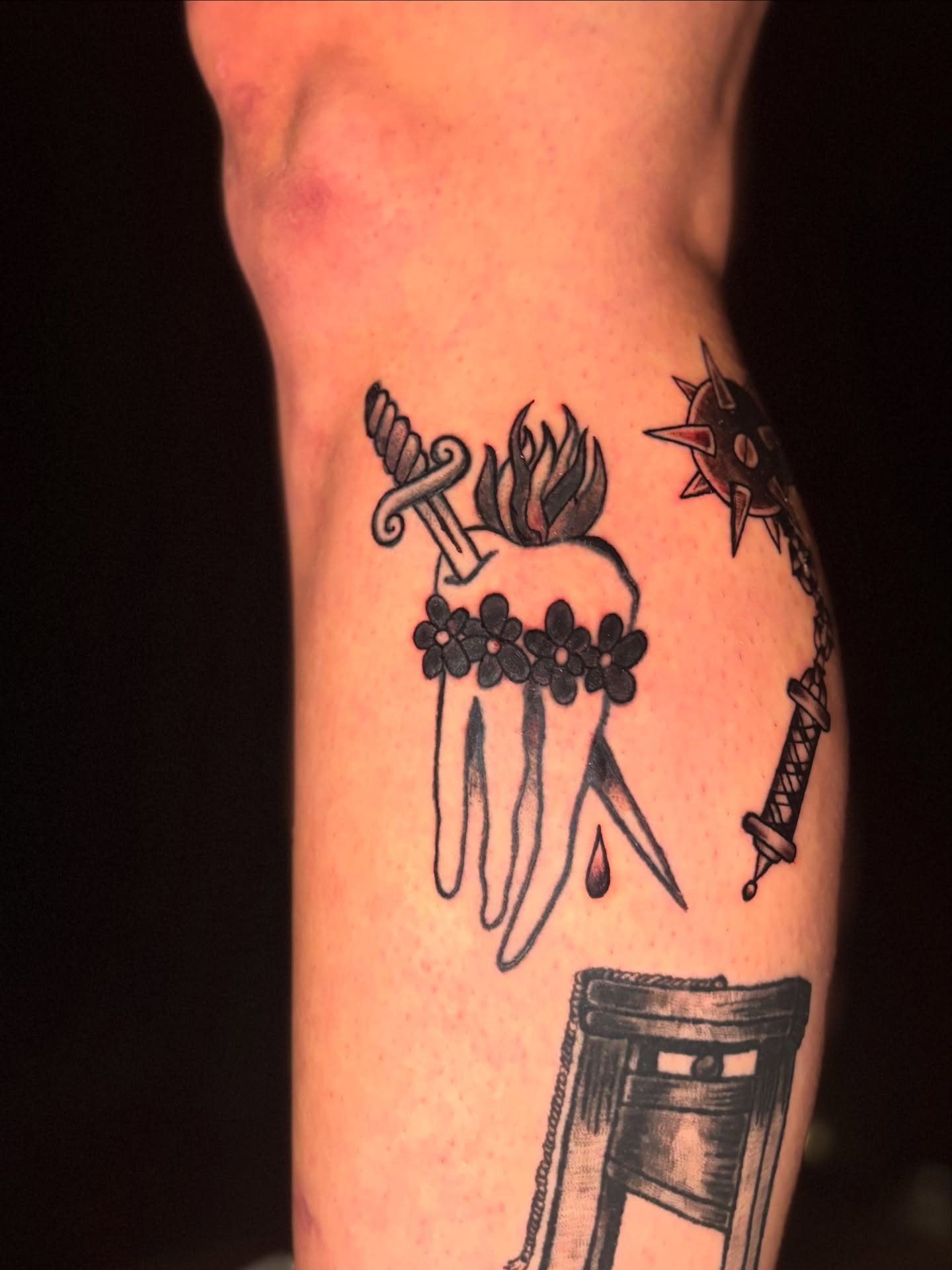Hand with dagger and flowers American traditional tattoo on the forearm by Rachel