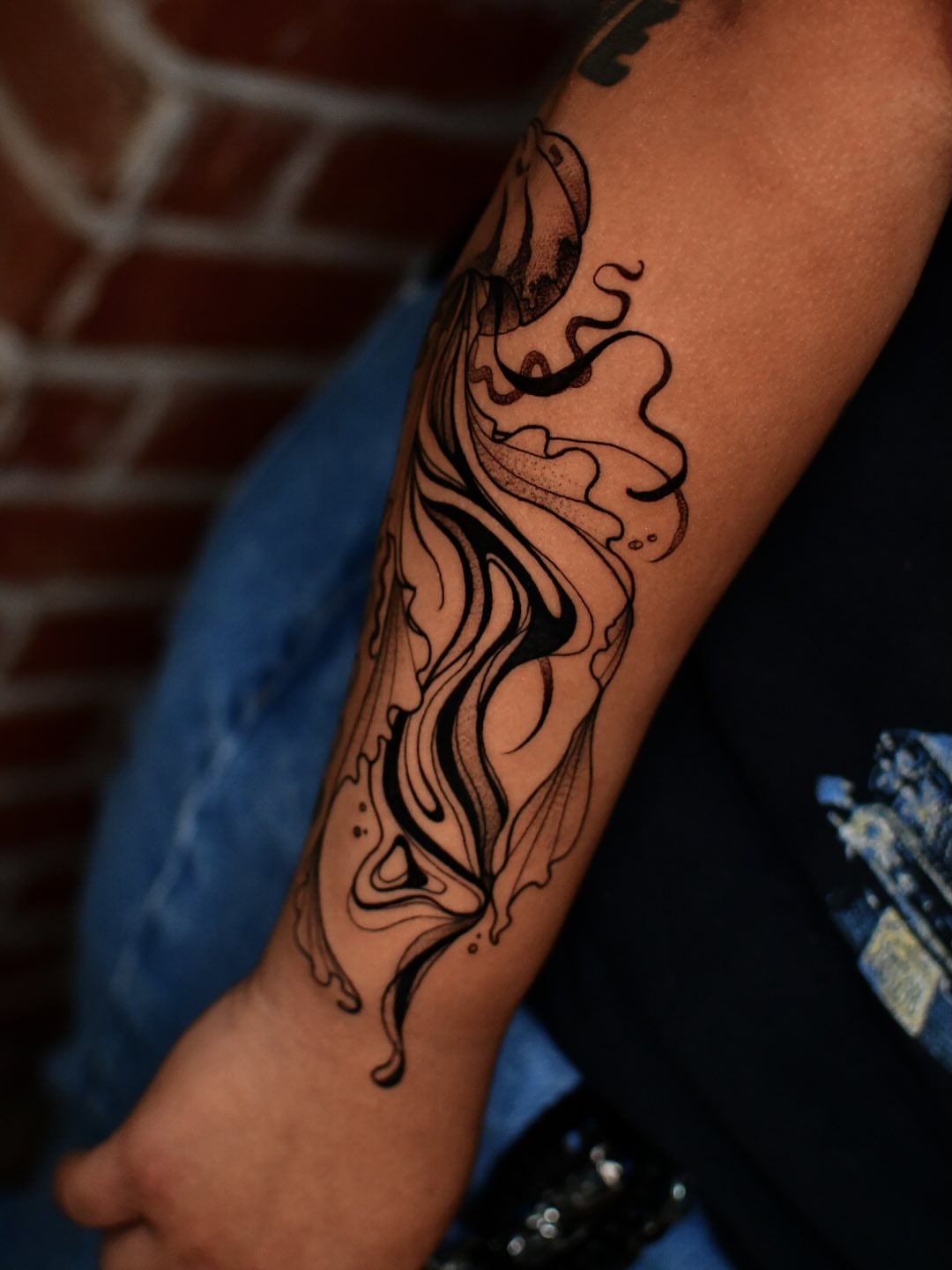 Flame black and grey tattoo on the forearm by Karina πΌ Orange County Tattoo Artist