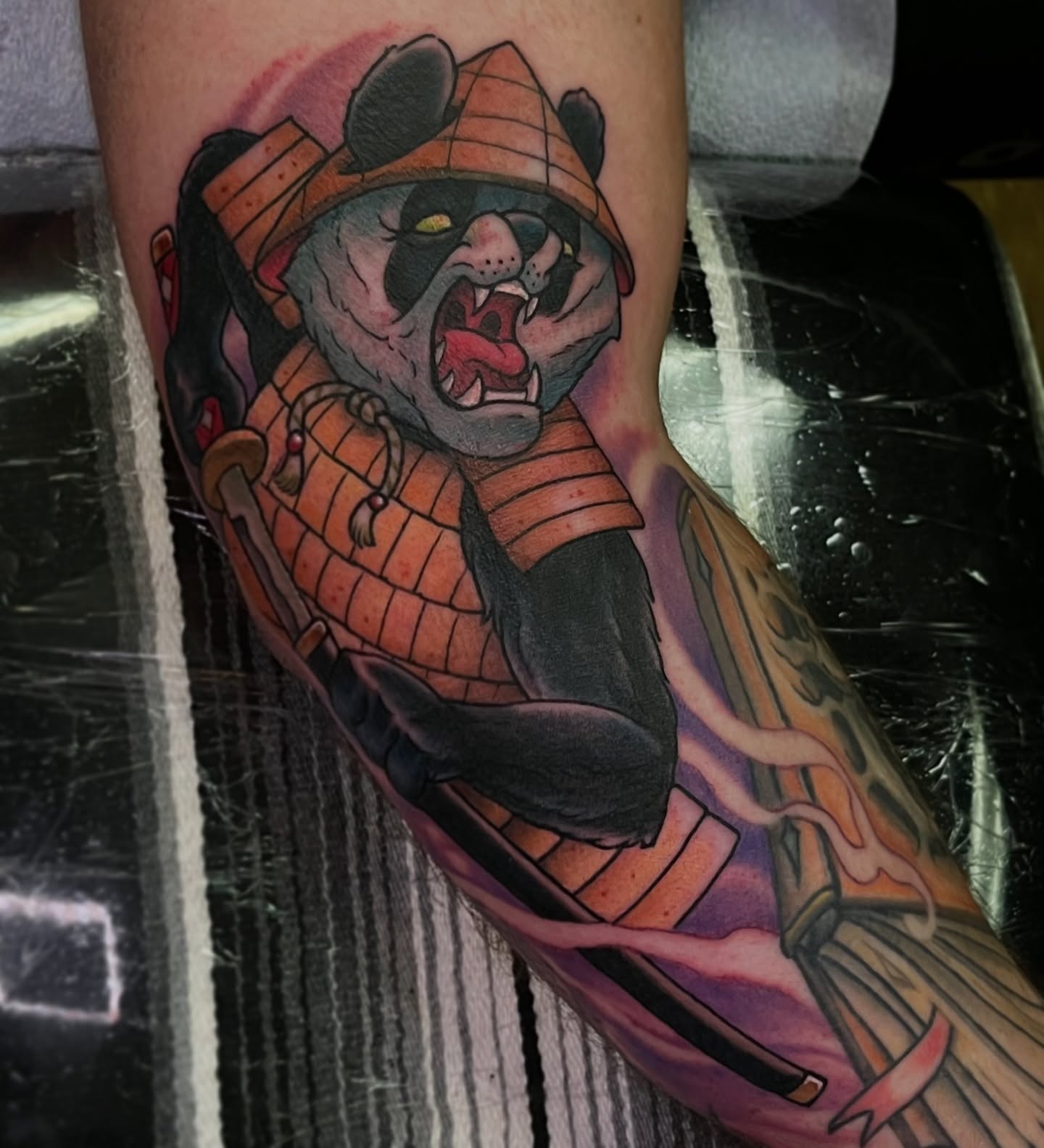 Panda warrior American traditional tattoo on the forearm by Evan Perrine