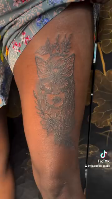 Owl with flowers realism tattoo by Eli Flores
