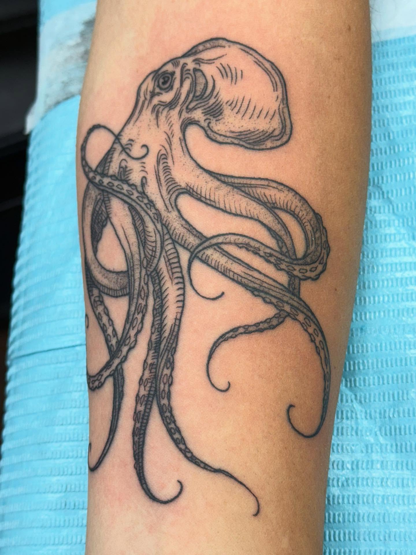 Octopus black and grey tattoo on the forearm by Aaron Hassler, Nashville, Tennessee
