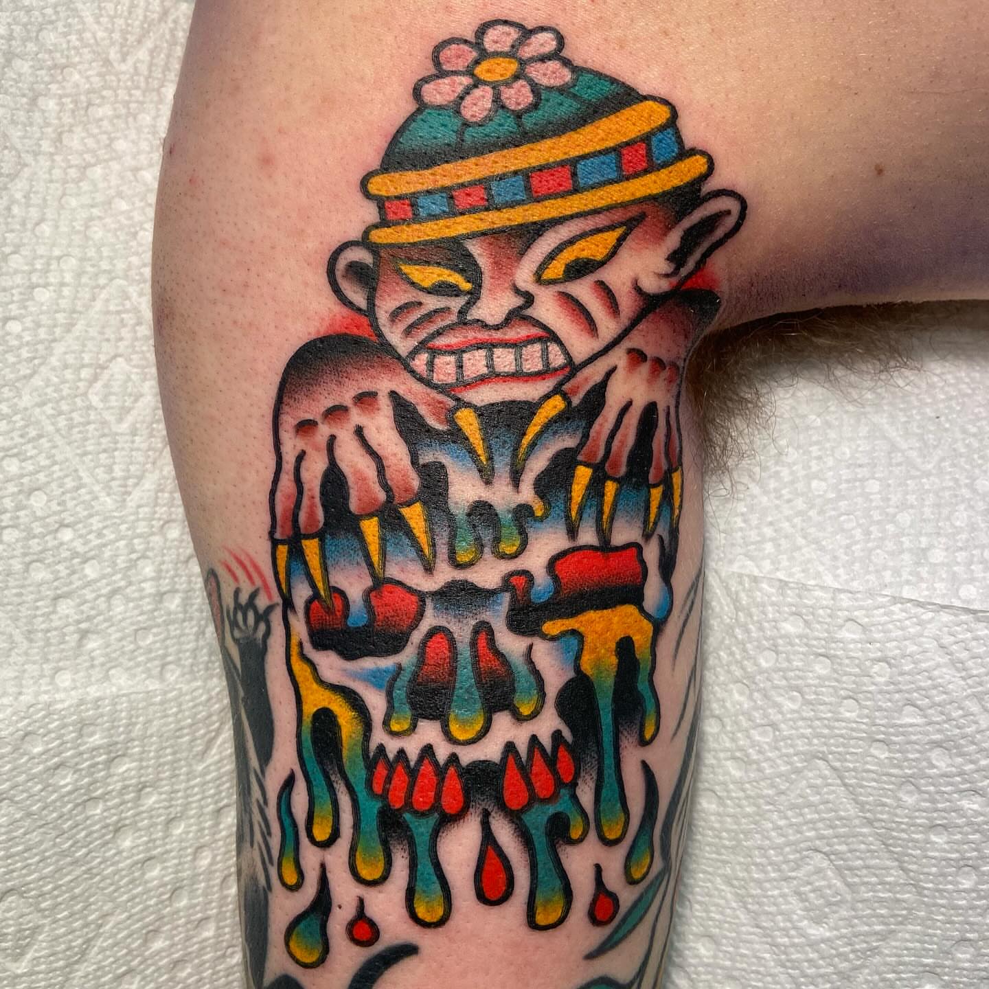 Dripping skull American traditional tattoo on the forearm by Anthony Jaeger, Seattle, Washington