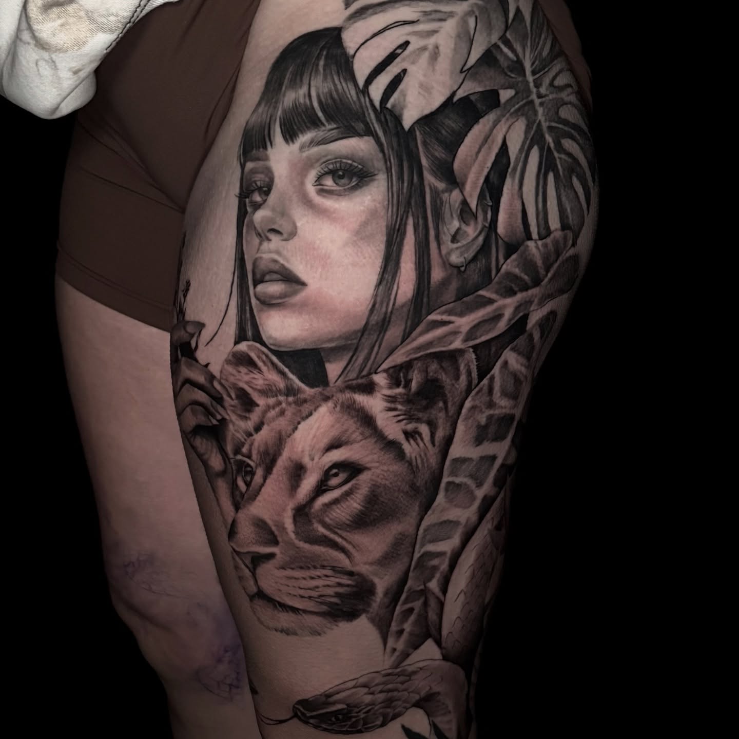 Tattoo by @scarlet.tattooz — realism, black_and_grey