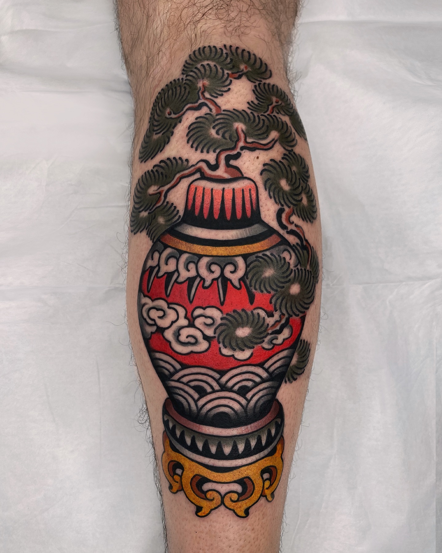 Jar with smoke American traditional tattoo on the forearm by Wes Hoffman