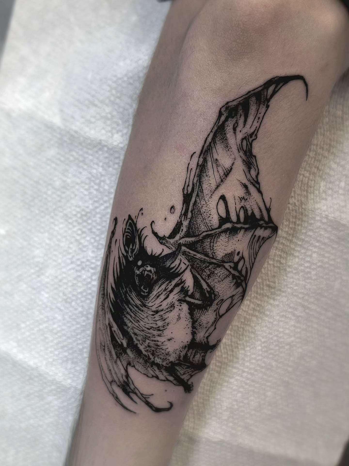 Bat dotwork tattoo on the forearm by Luca