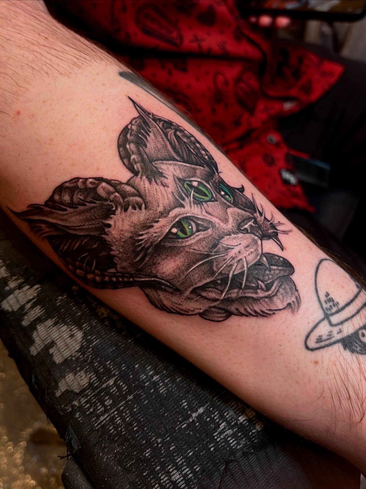 Panther realism tattoo on the forearm by Morgan Jones