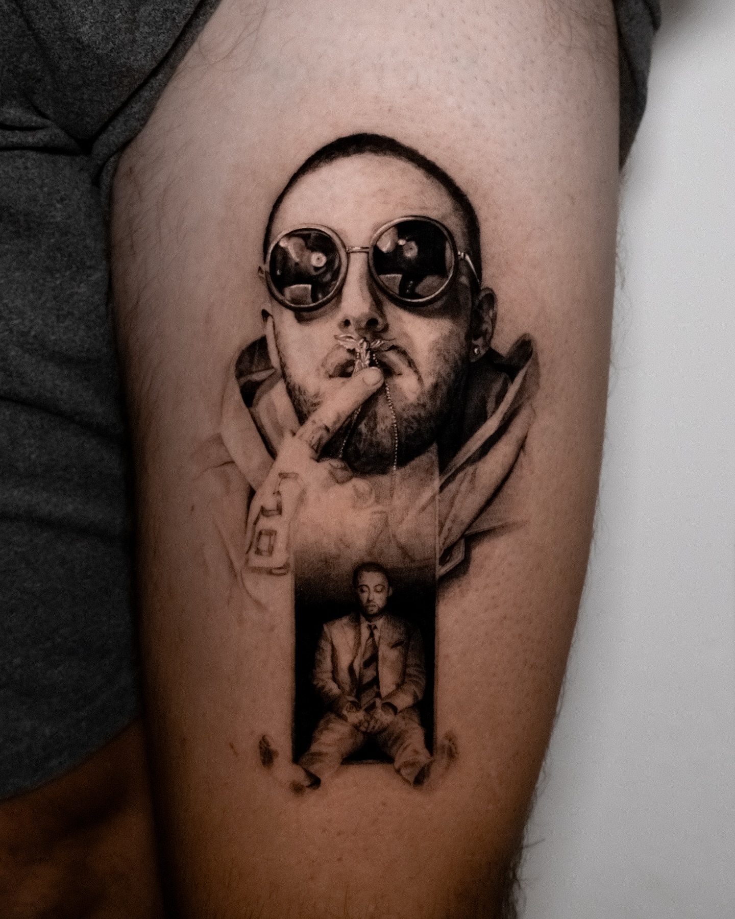 Smoking man realism tattoo on the thigh by Riley K Turner