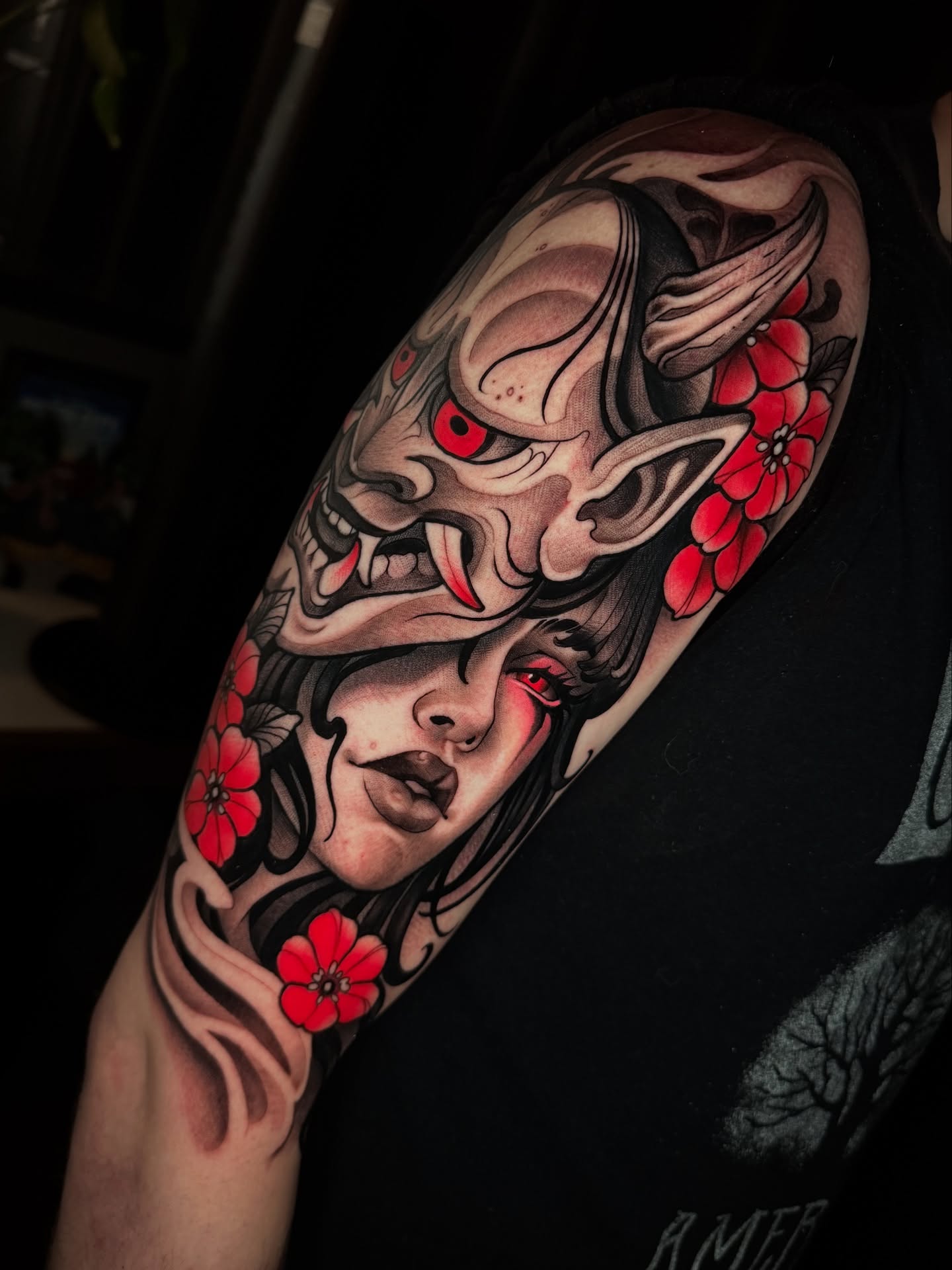Demon mask and woman japanese irezumi tattoo on the upper arm by Freddie Brown, Lombard, IL