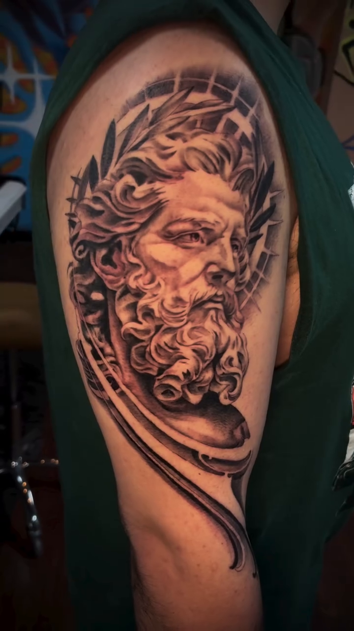 Bust of Zeus realism tattoo by Alexandria
