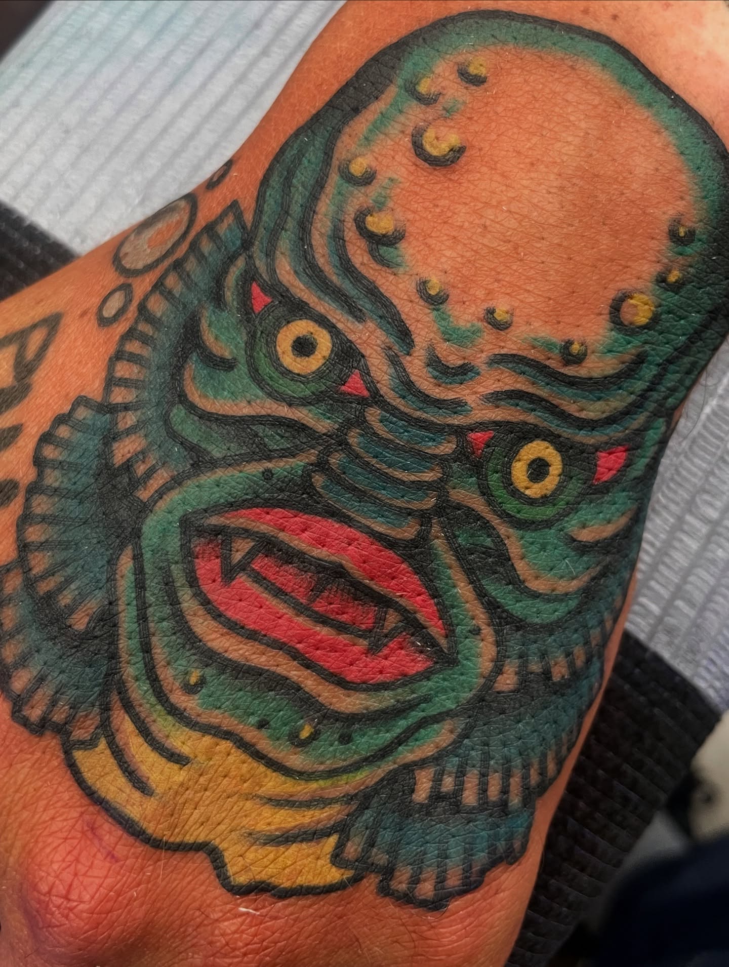 Monster American traditional tattoo on the forearm by matt nelson