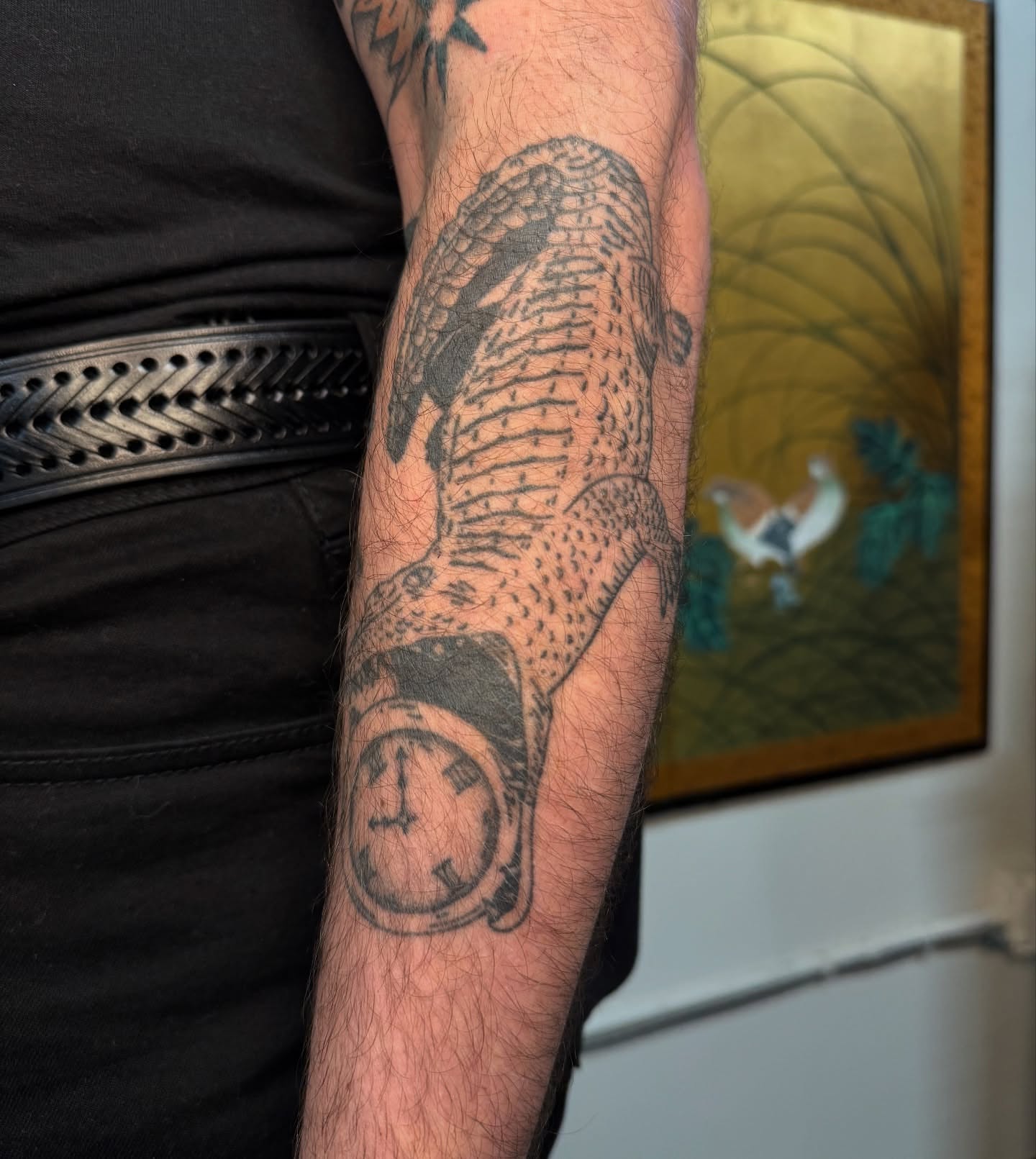 Fish and clock dotwork tattoo on the forearm by Mazie