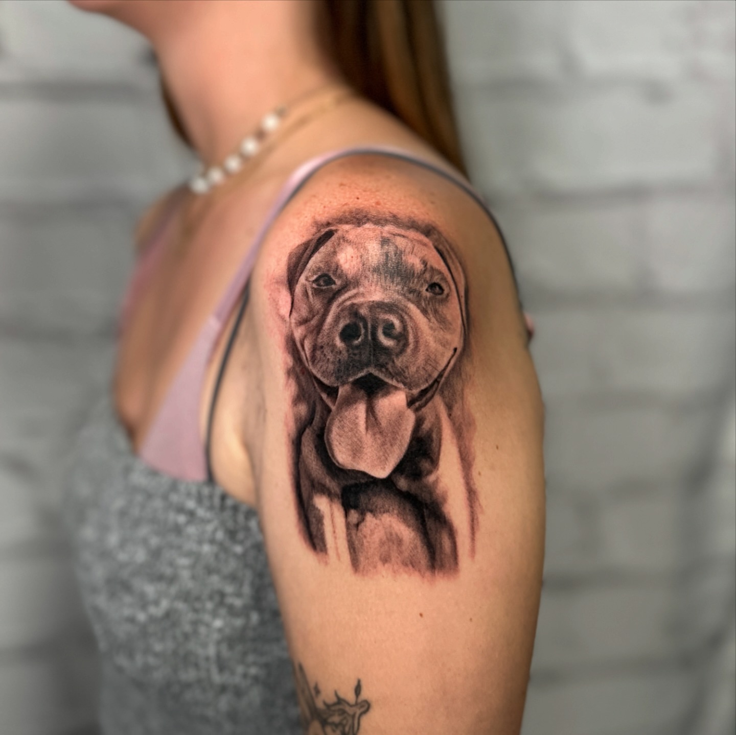 Pit bull realism tattoo on the shoulder by Stephen Hansen