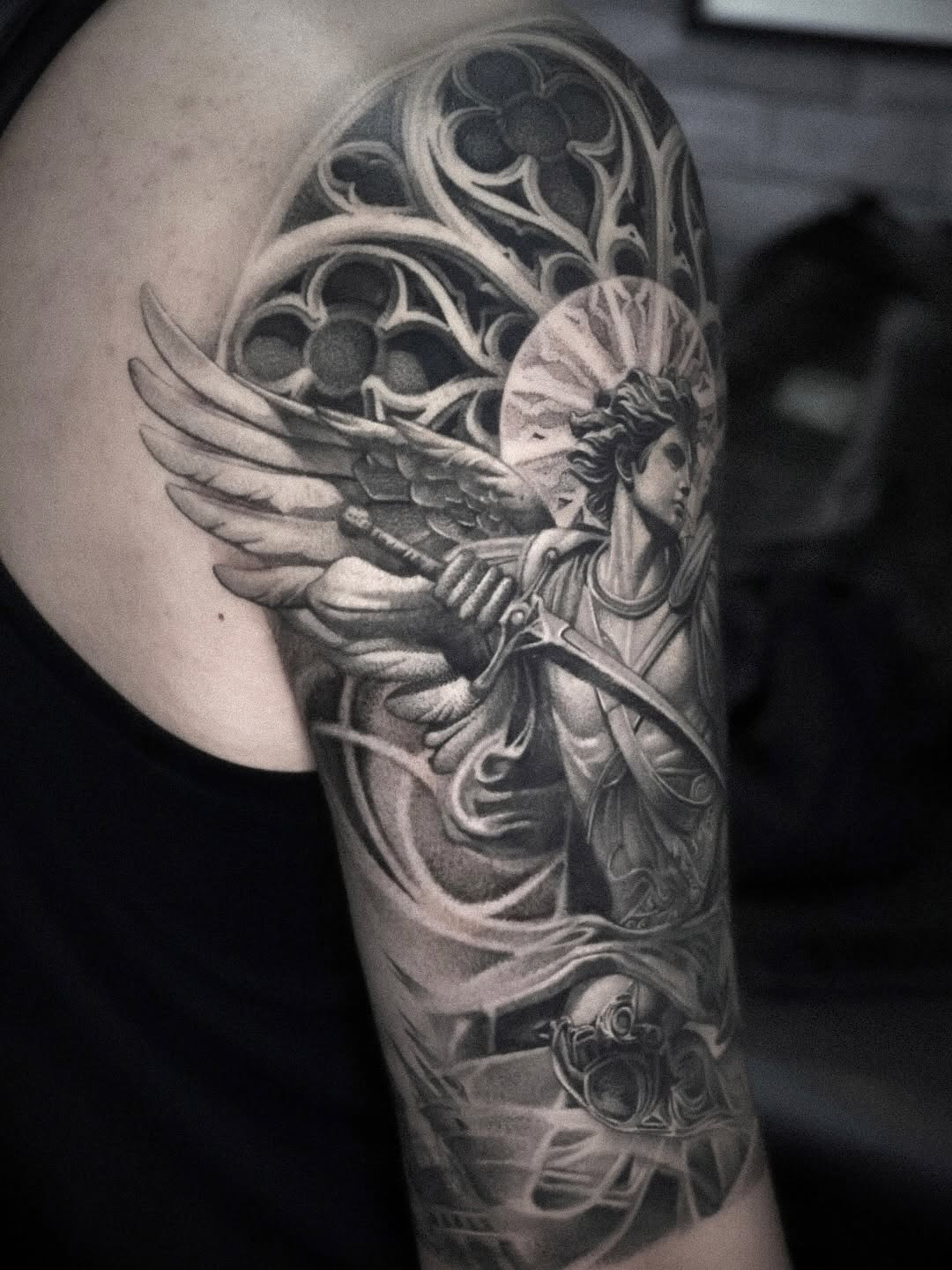 Angel with sword and gothic window realism tattoo on the forearm by D A N N y L I N