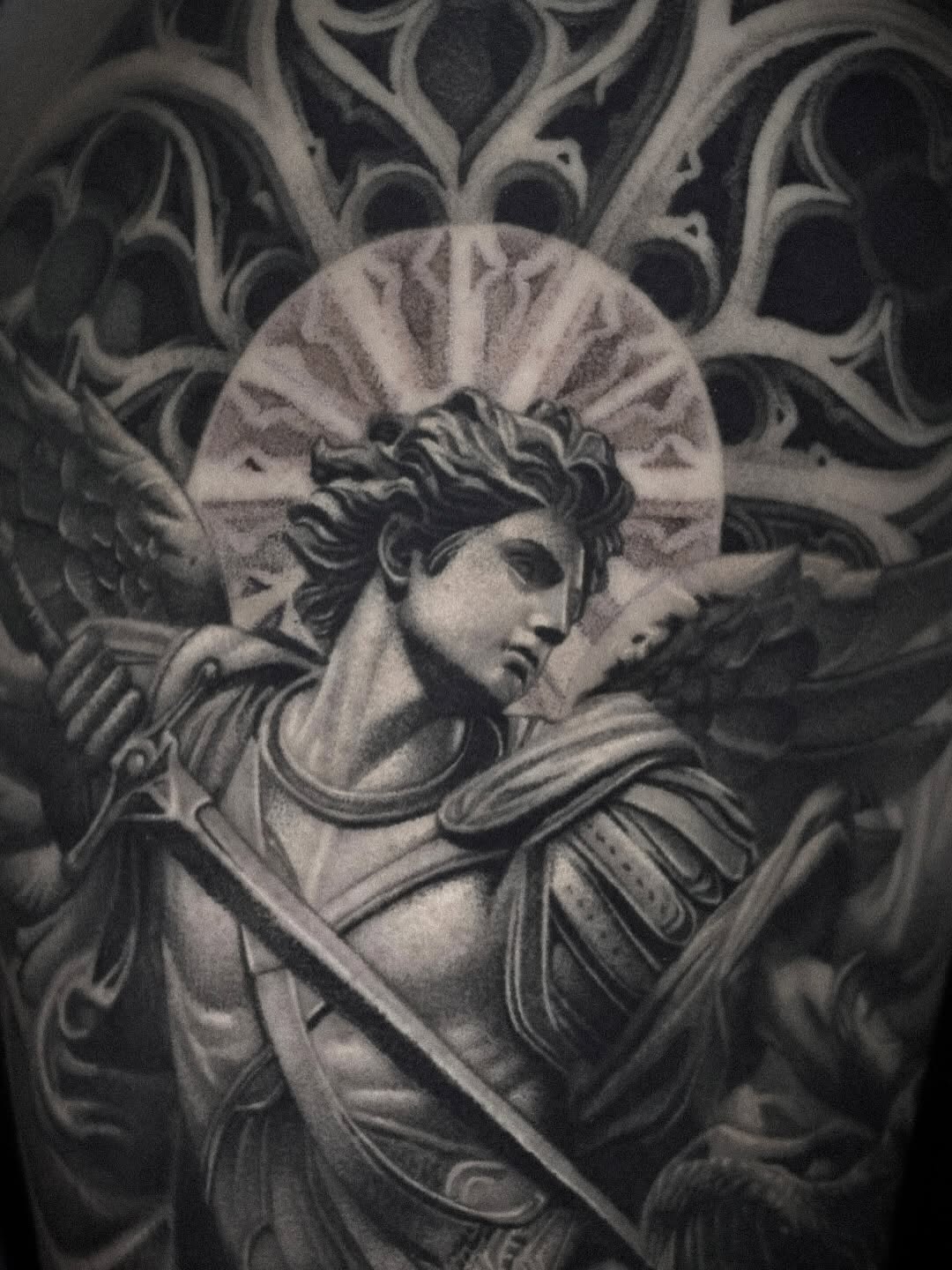 Archangel Michael realism tattoo on the upper arm by D A N N y L I N