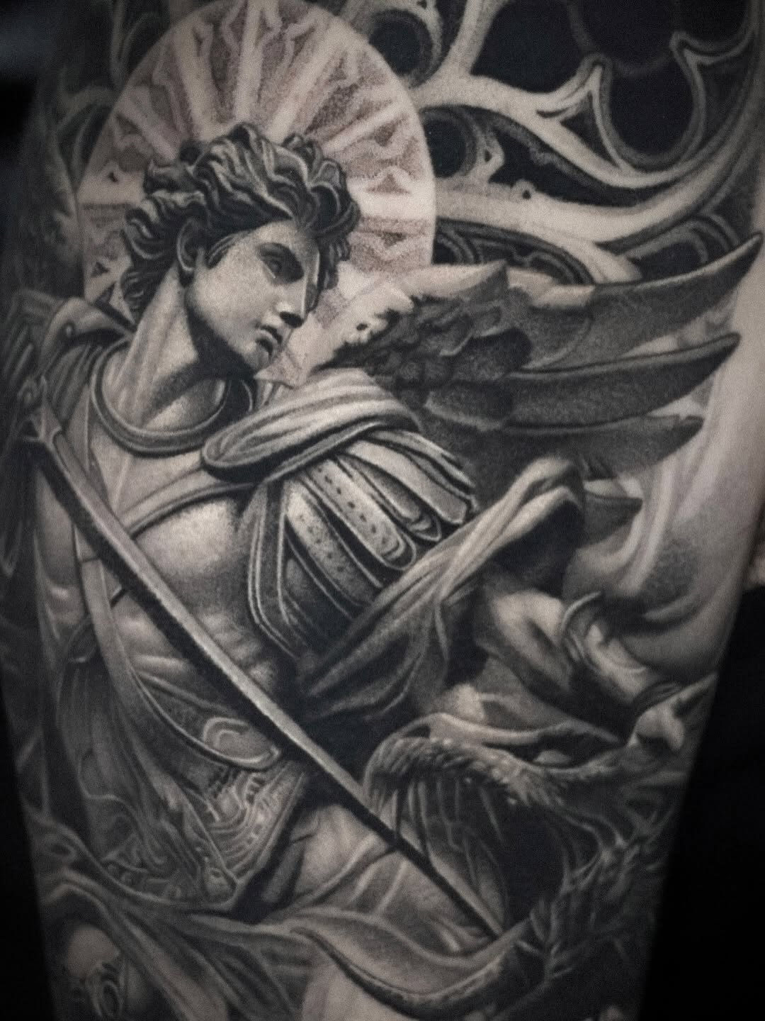 Angel with sword realism tattoo on the forearm by D A N N y L I N
