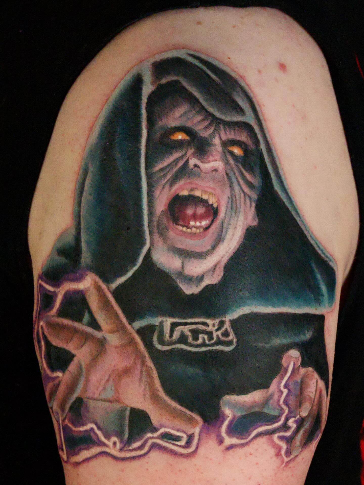 Ghoul dark realism tattoo on the forearm by Chris Lochbihler