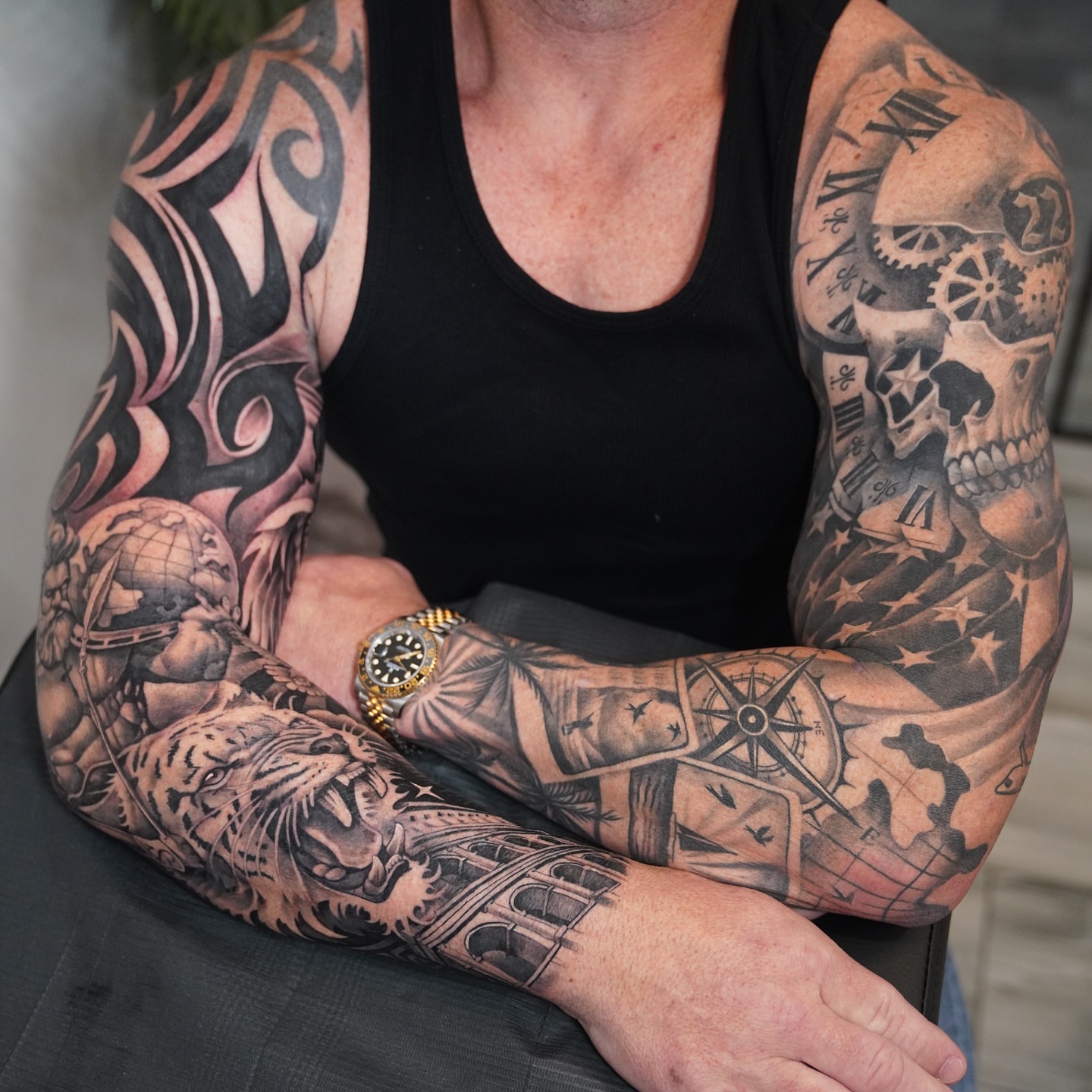 Full sleeve tattoo tribal tattoo on the upper arm by Artem Kunakuzin