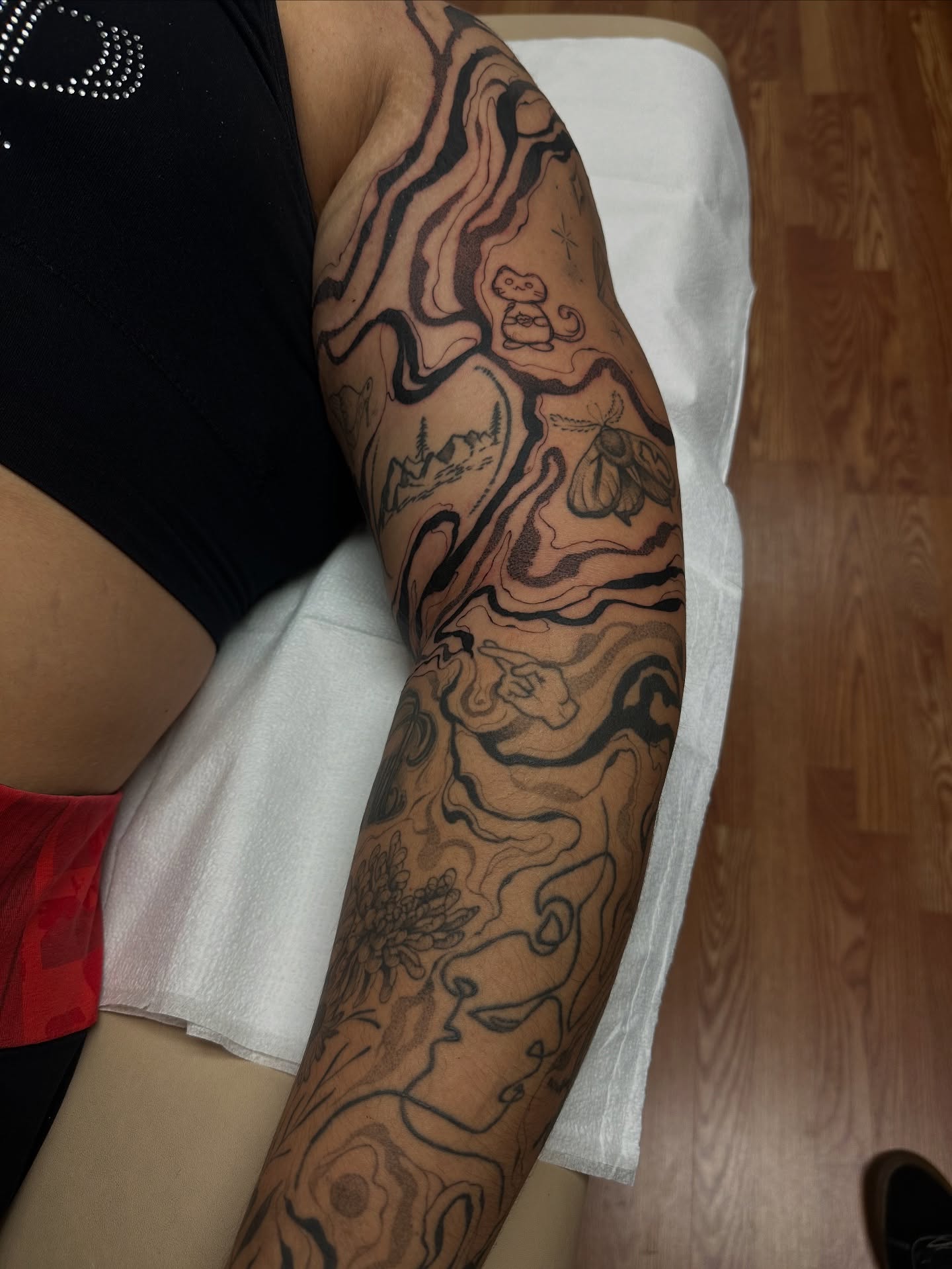 Abstract landscape black and grey tattoo on the forearm by Juan Vega (tony)