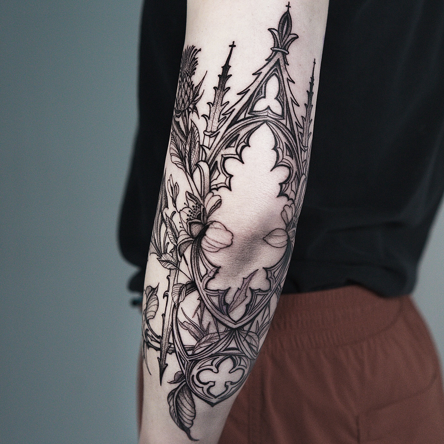 Gothic architecture and thistle ornamental tattoo on the forearm by H I R A  L U P E - tattoo artist, Oakland, California