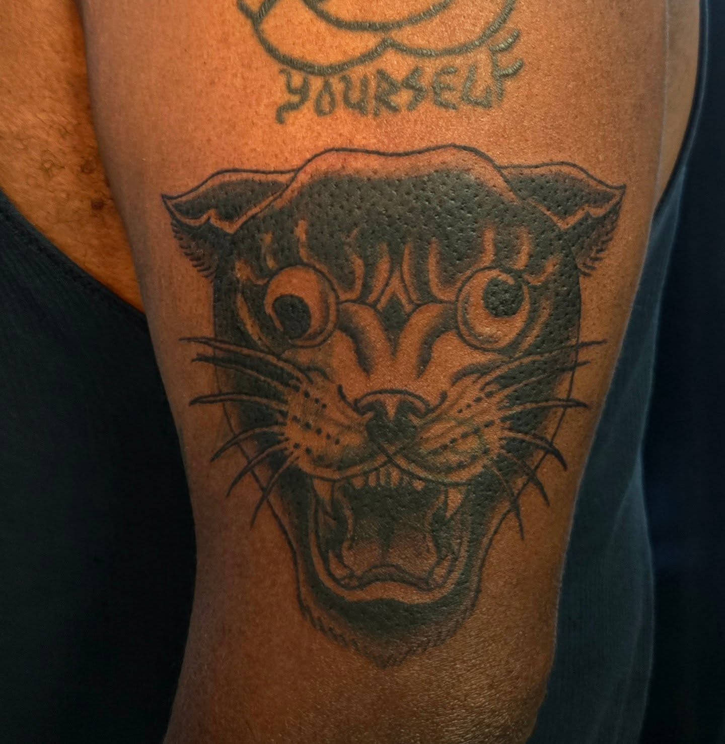 Panther dotwork tattoo on the forearm by Perry