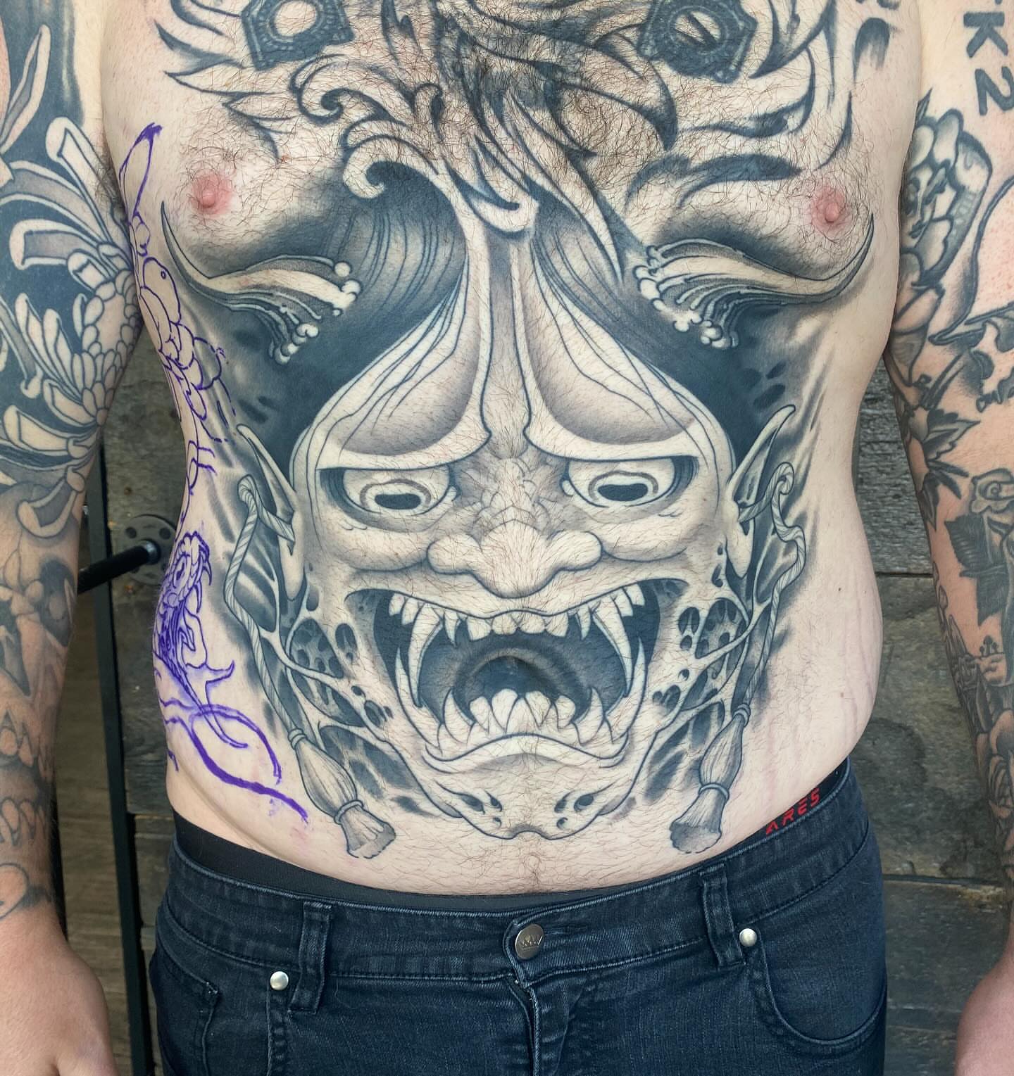 Demon face realism tattoo on the torso by Kyle Kozek, Columbus, Ohio