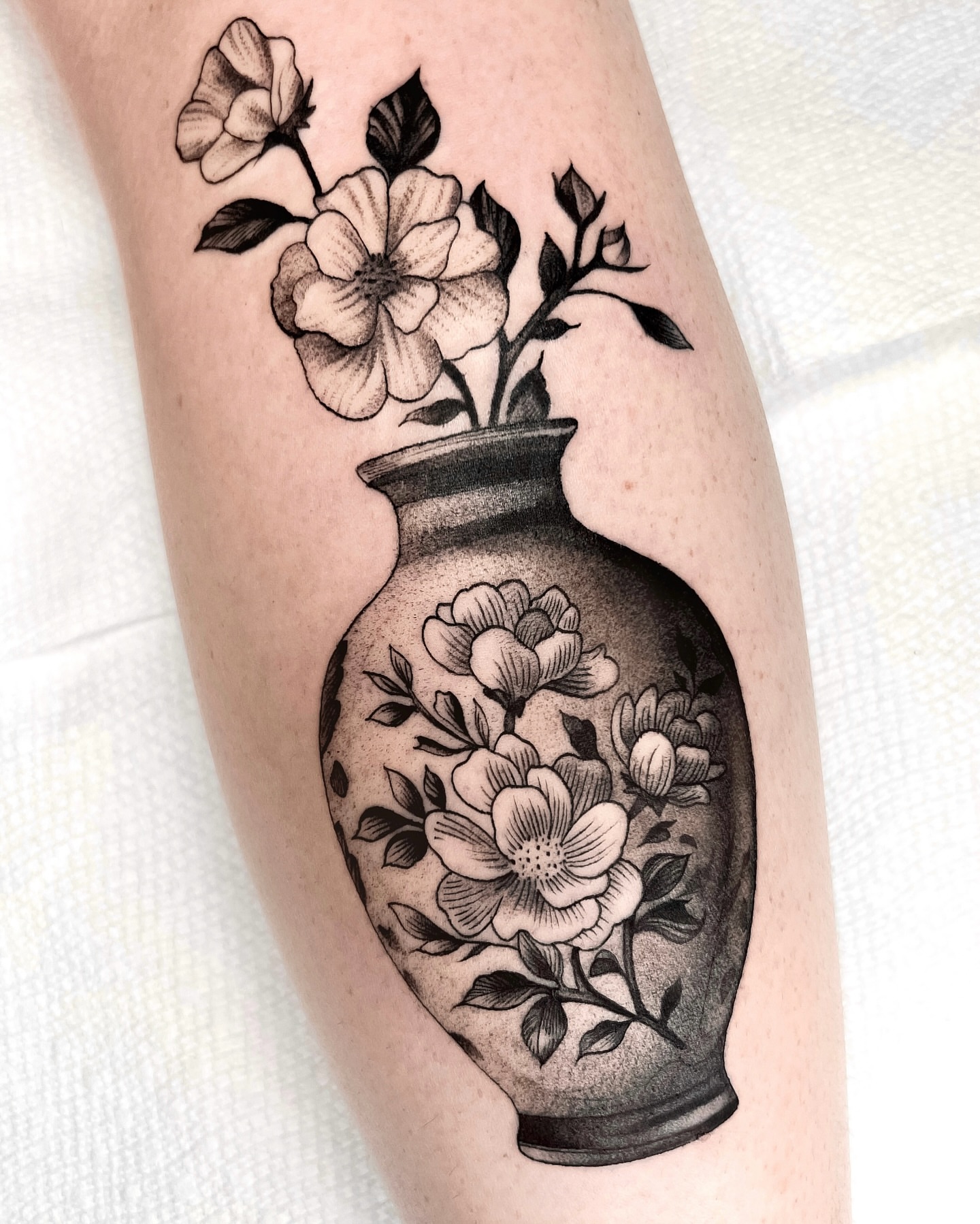 Flower vase black and grey tattoo on the forearm by 🤎Dannon 🕸