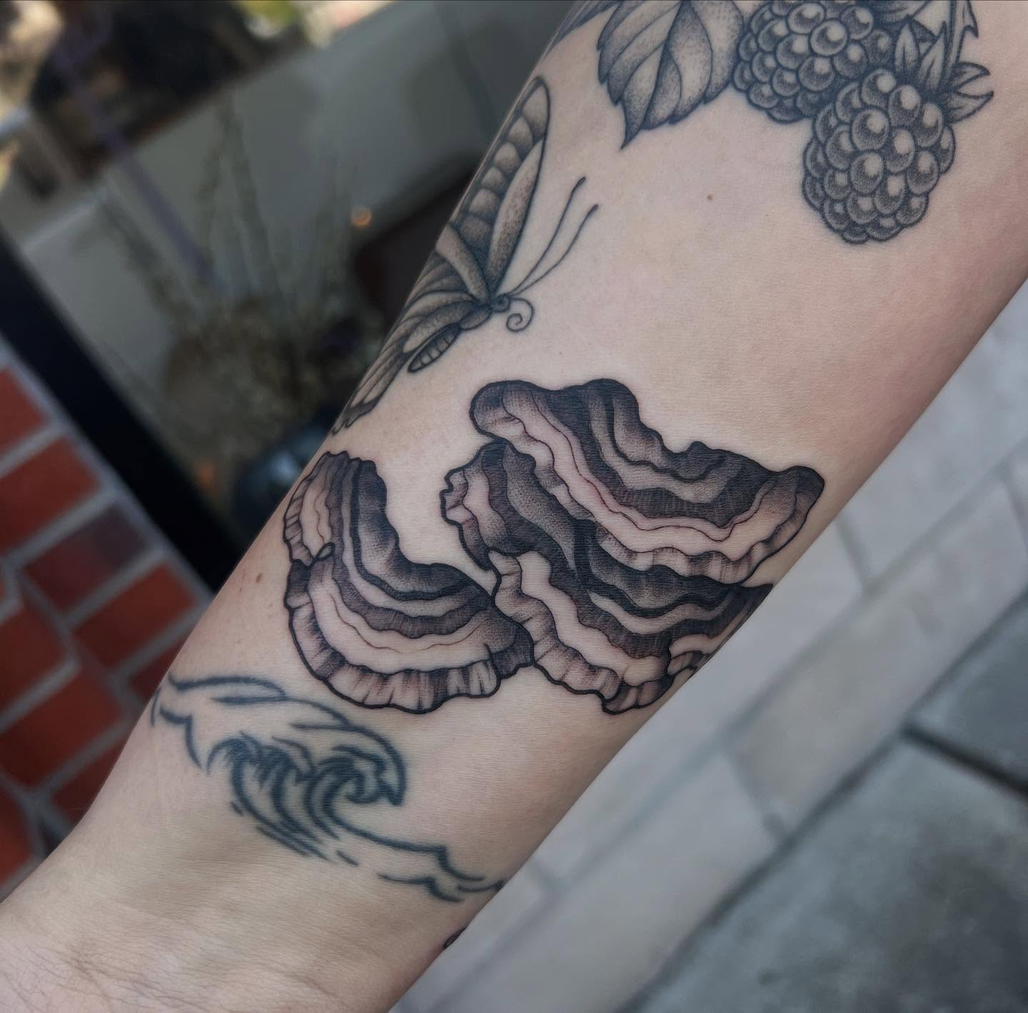 Fungi black and grey tattoo on the forearm by Tasha Venola, Bellingham, Washington