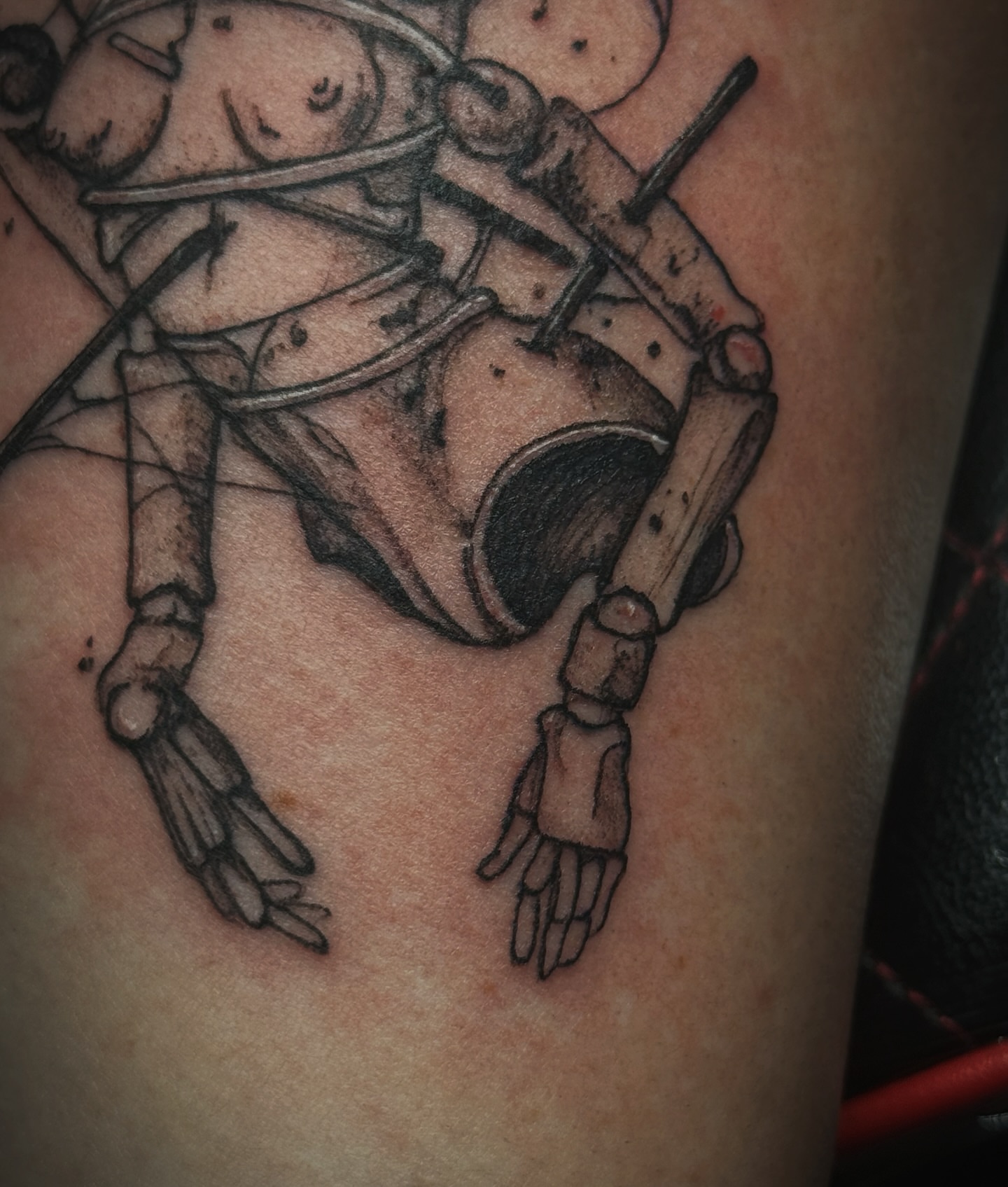 Astronaut black and grey tattoo on the thigh by Kaylee Castleton, Tooele, Utah