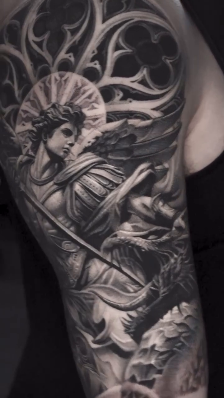 Archangel Michael battling a dragon realism tattoo by D A N N y L I N