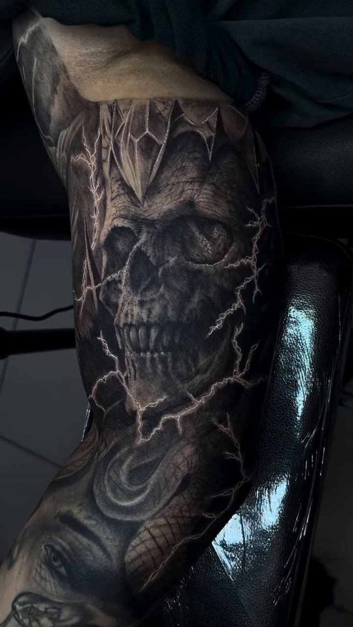 Tattoo by @elmertattoo1 — dark_realism, black_and_grey