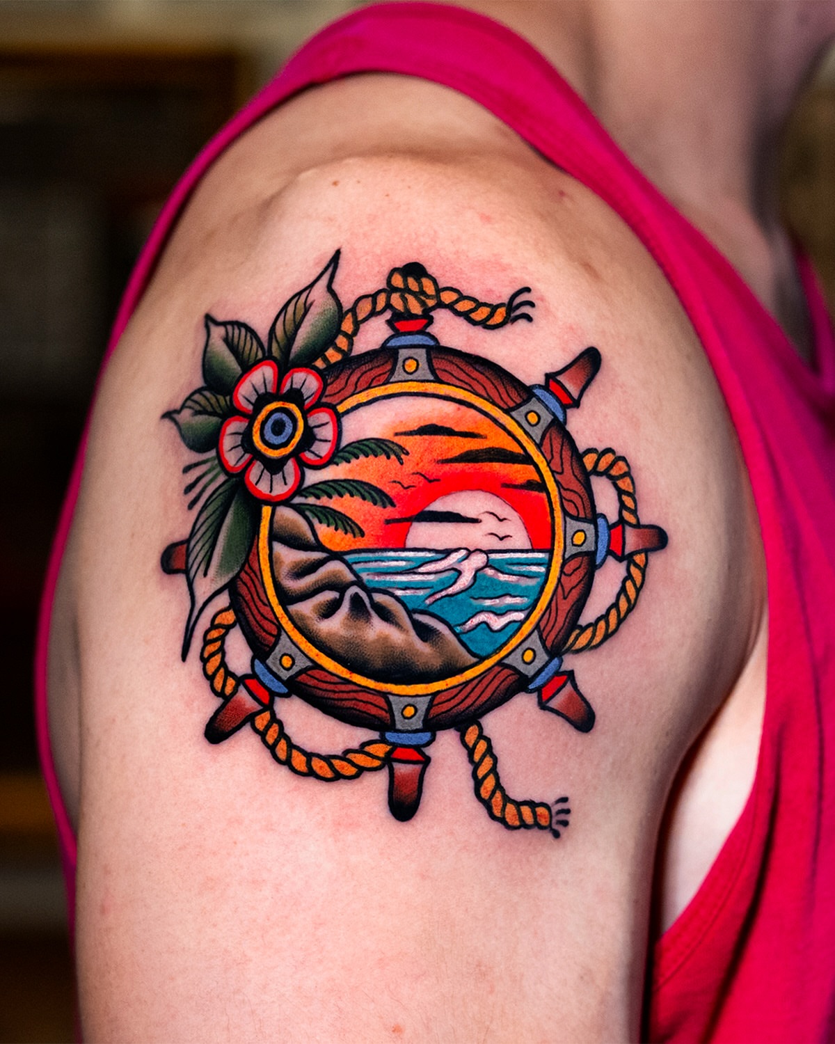 Ship wheel American traditional tattoo on the shoulder by Miguel Comin