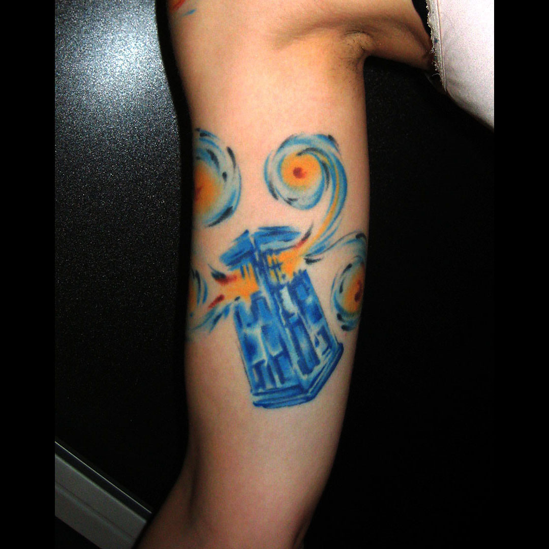 TARDIS watercolor tattoo on the forearm by Dave Chercourt, Willoughby, Ohio